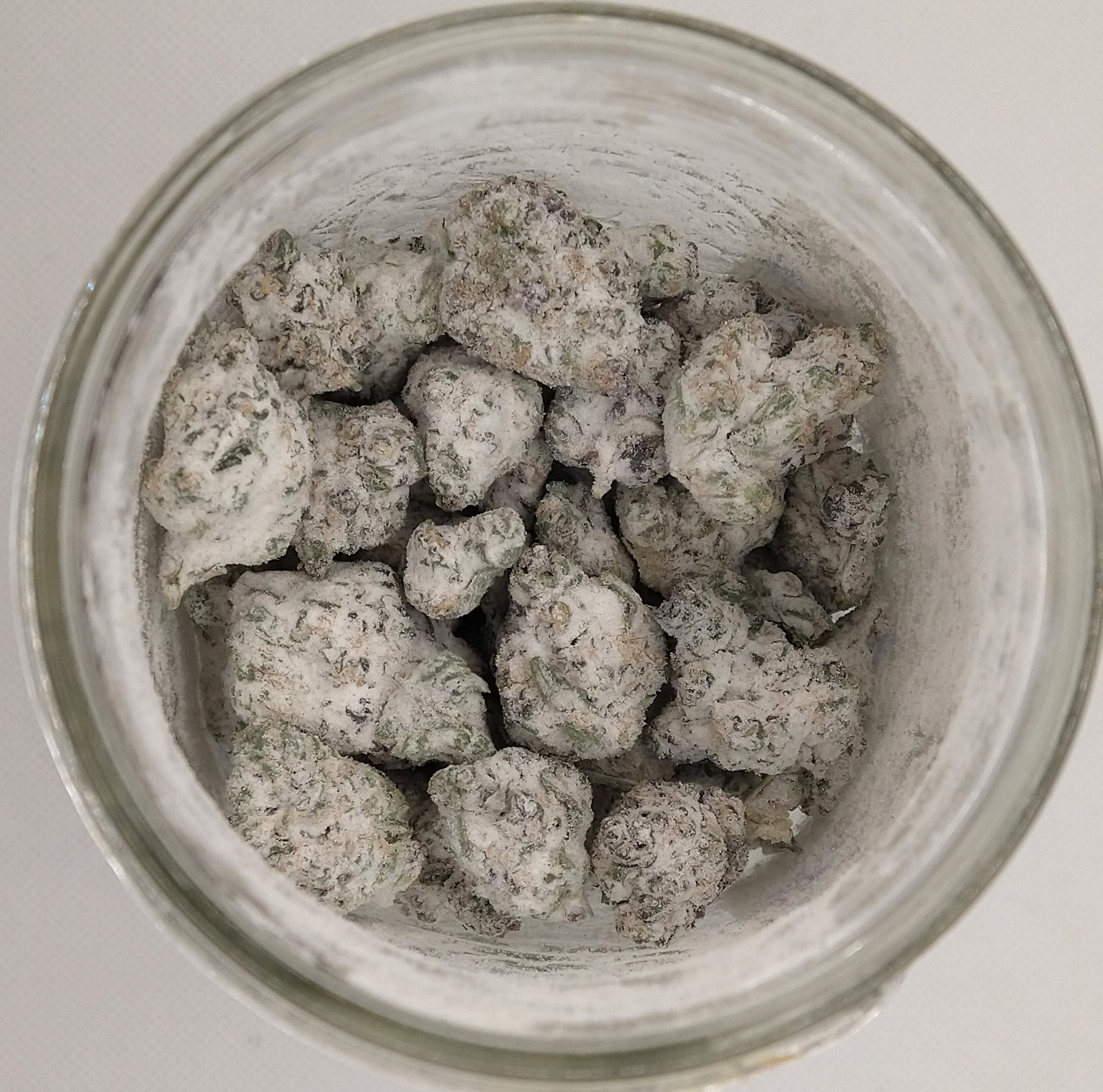 Photograph of product: GoldKine | Head Hunter | Snow Caps Infused Flower | Hybrid - 1g