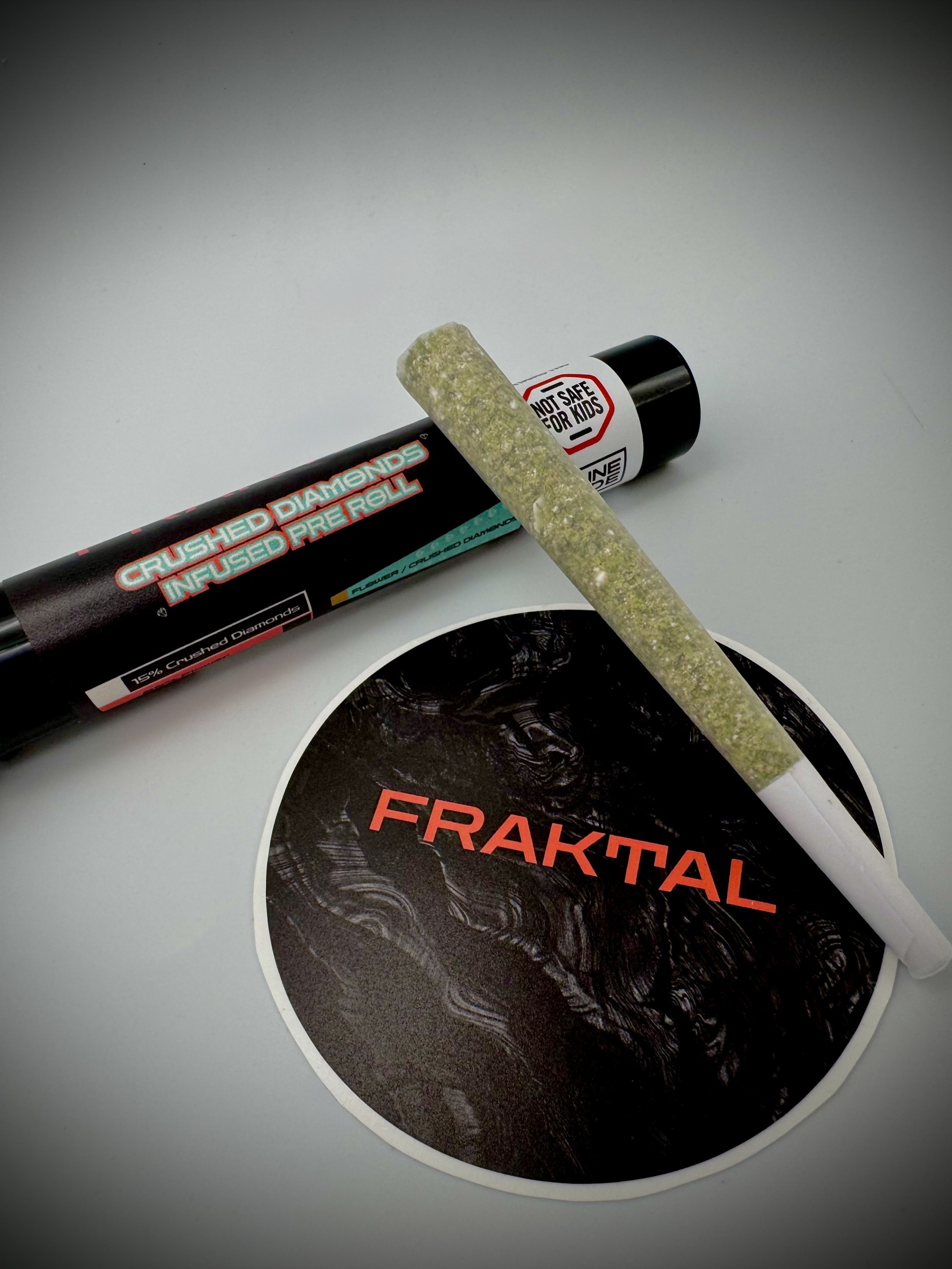 Photograph of product: Gorilla Glue Diamond Infused Pre-Roll | Oui'd | Fraktal