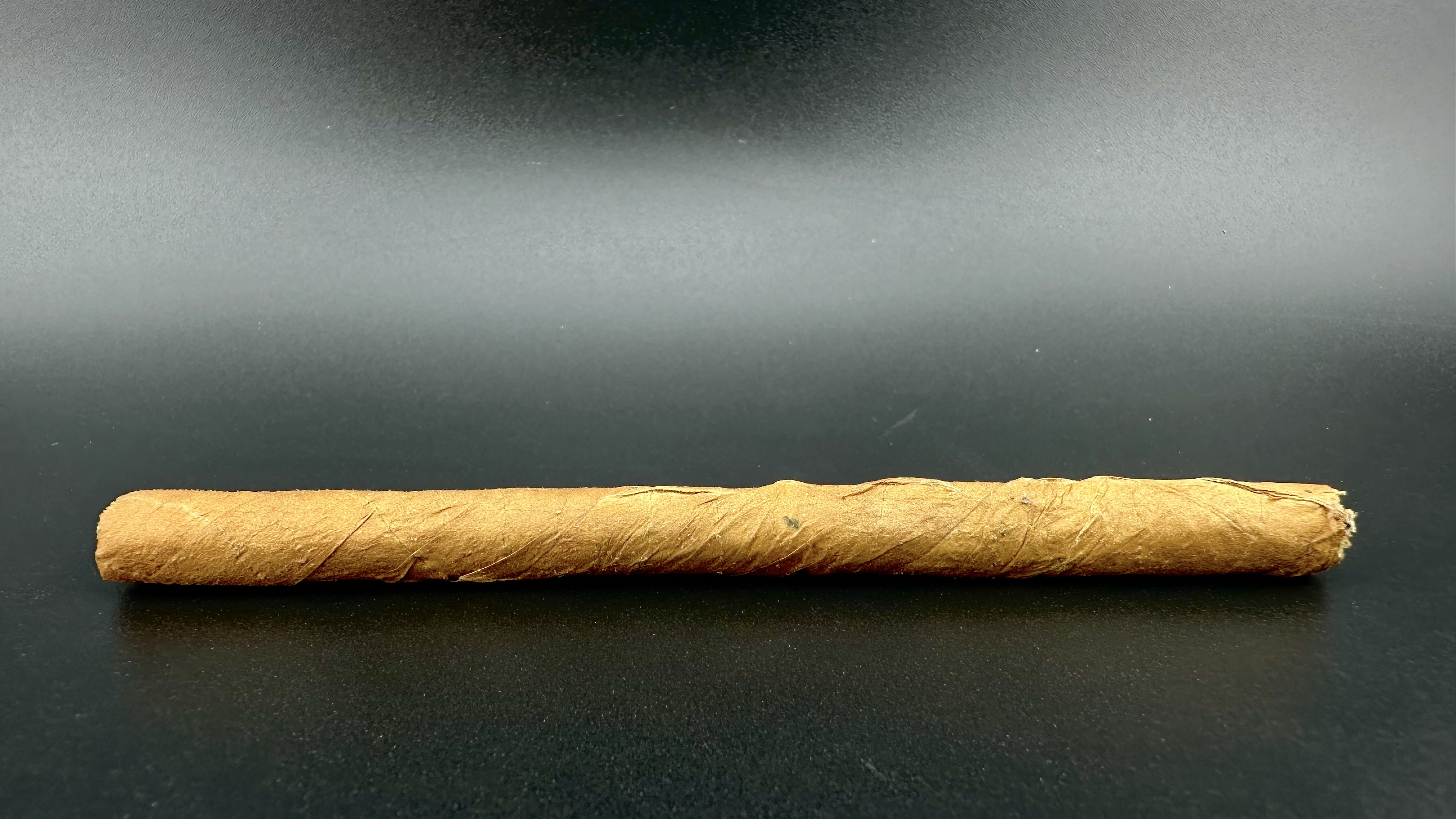Photograph of product: Thin Mintz Unflavored Game Blunt Purple Co.