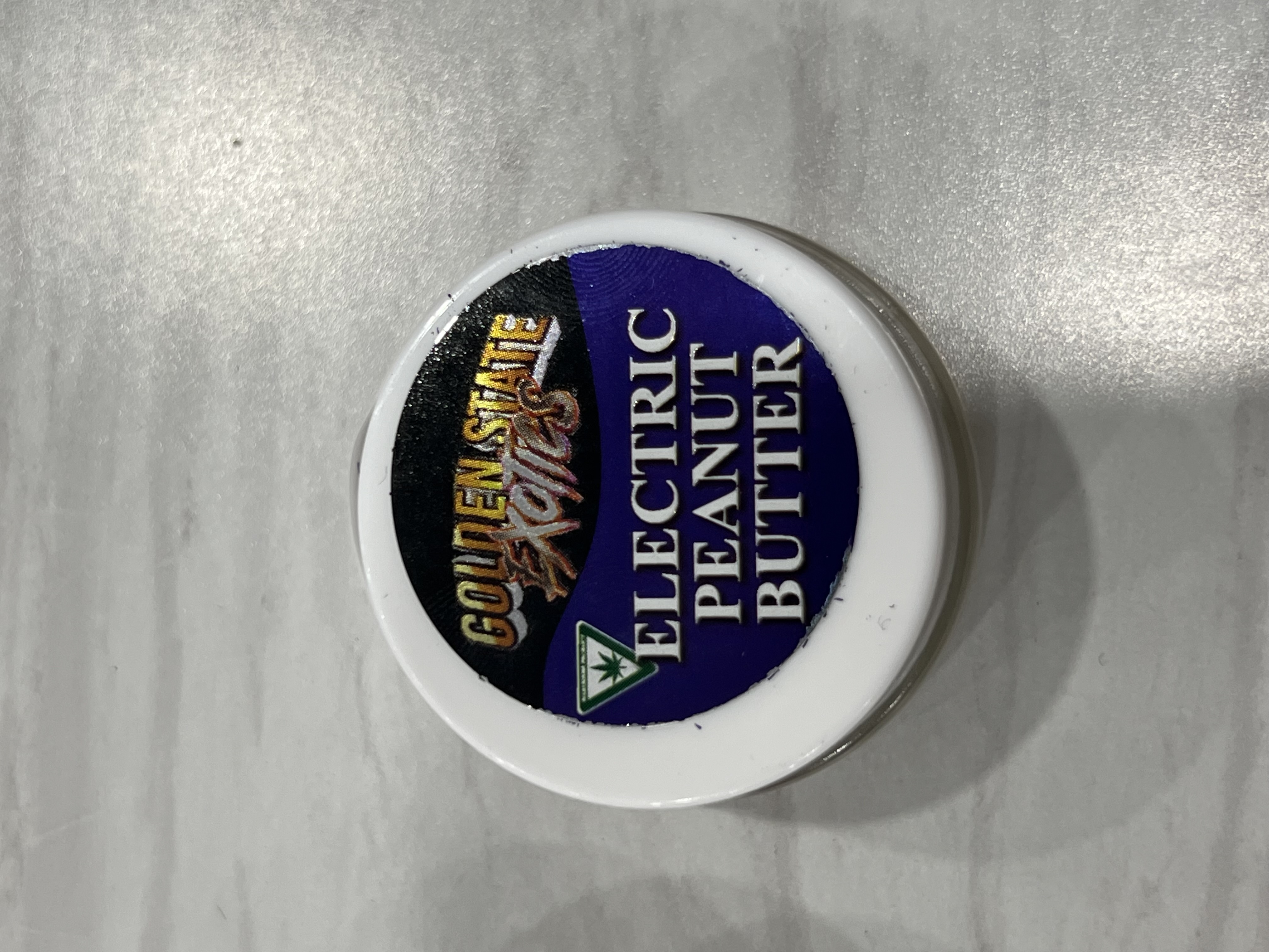 Photograph of product: Electric Peanut Butter Live Resin