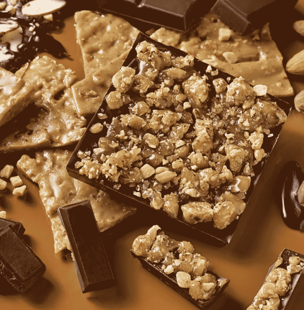 Photograph of product: MINDY'S DARK CHOCOLATE ALMOND TOFFEE BAR 100MG