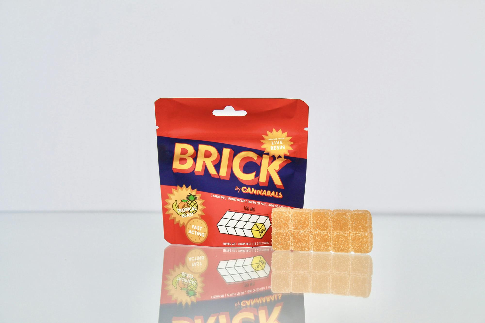 Photograph of product: Cannabals "Brick" Live Resin Gummies | 10 count (10mg each) | Tropical Blast