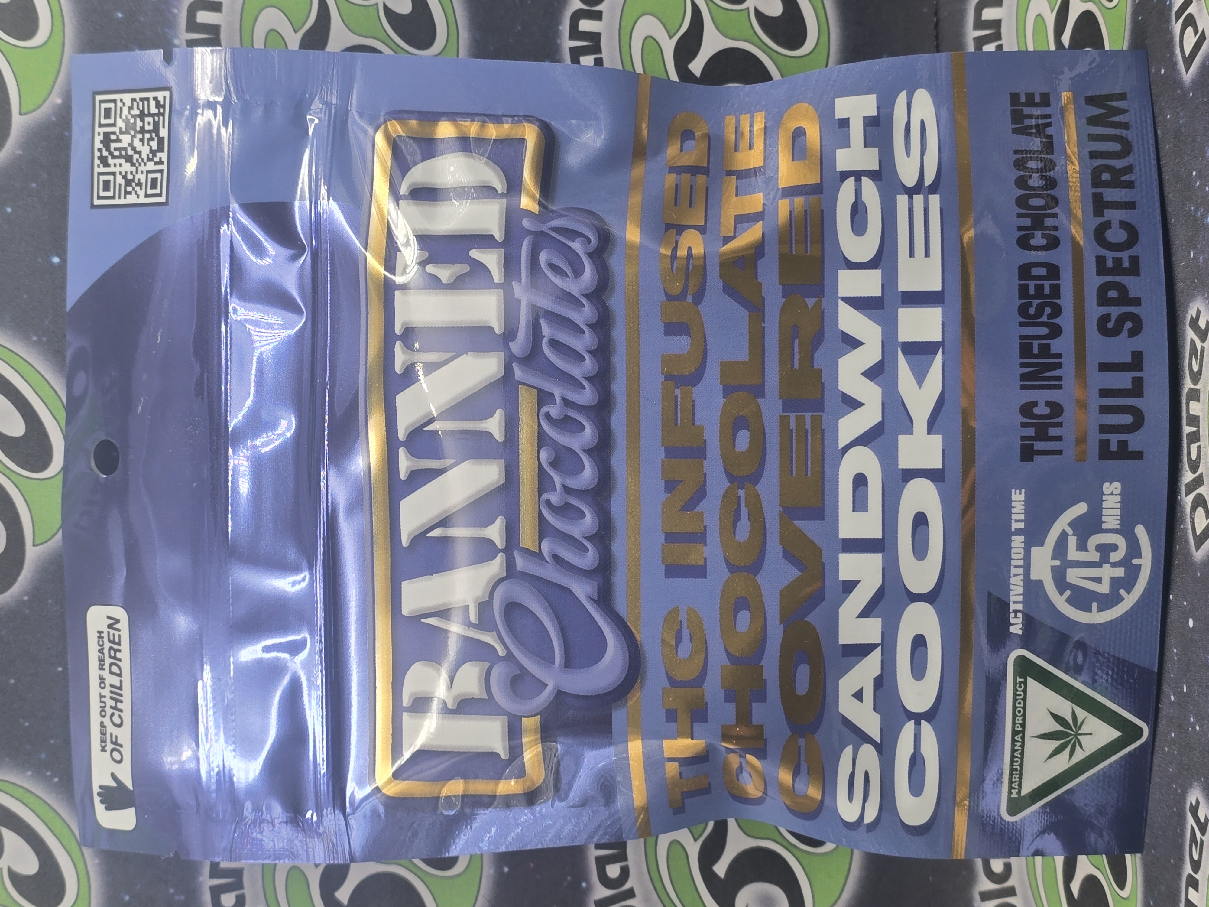 Photograph of product: Banned | Chocolate Covered Vanilla Sandwich Cookies | 70mg x 3 Cookies
