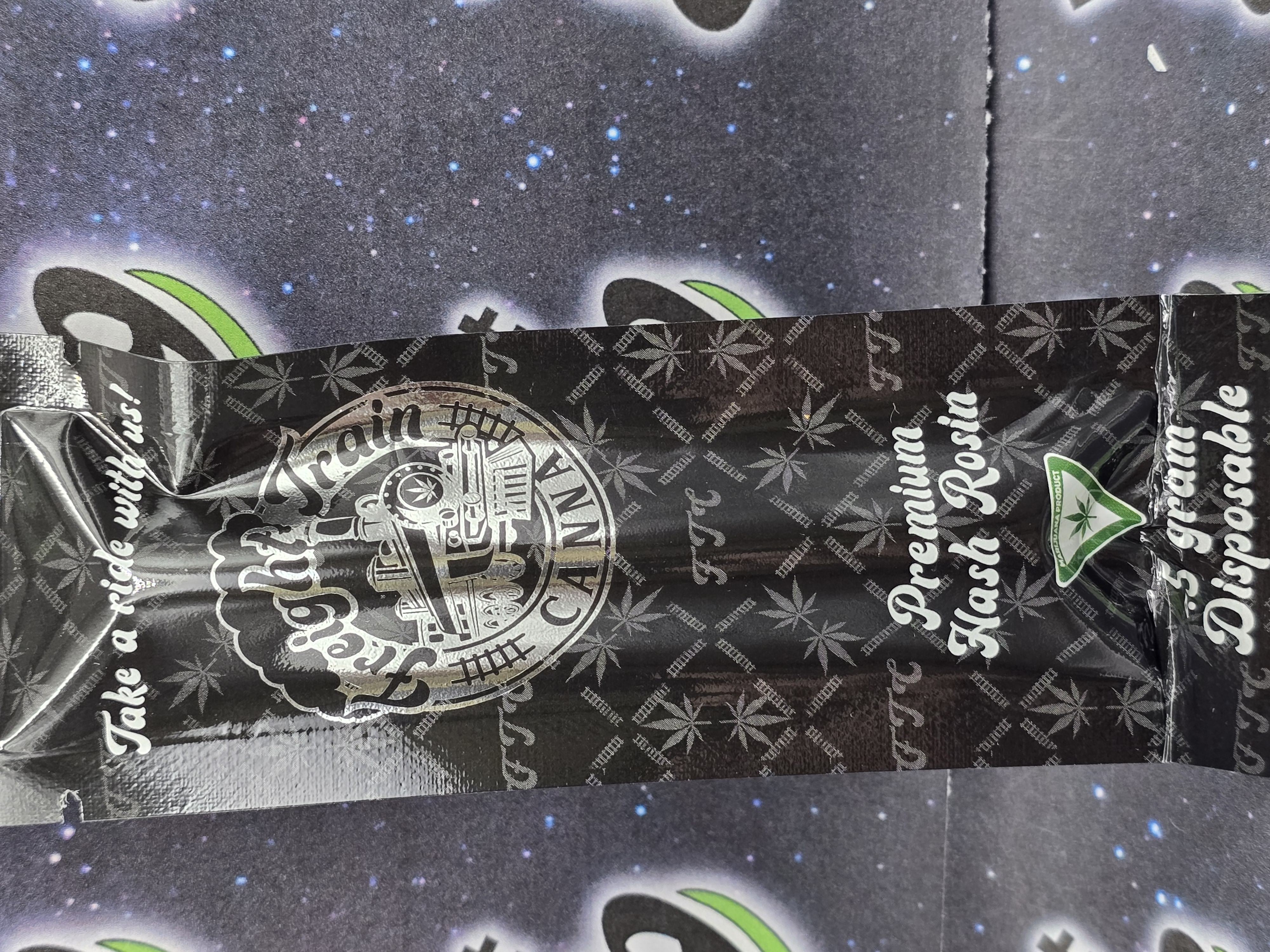 Photograph of product: Freight Train Canna | Space Runtz au chocolat Rosin Disposable