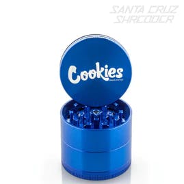 Photograph of product: COOKIES 4 PIECE MEDIUM ALUMINUM GRINDER - BLUE