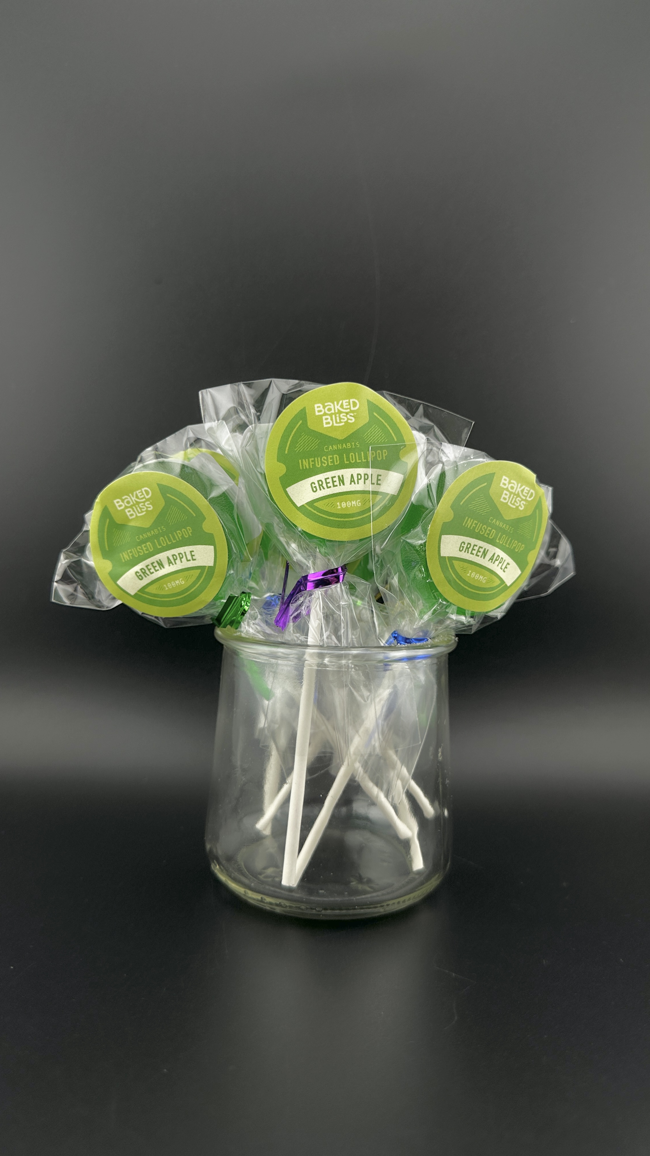 Photograph of product: 100mg Green Apple Lollipop | Baked Bliss