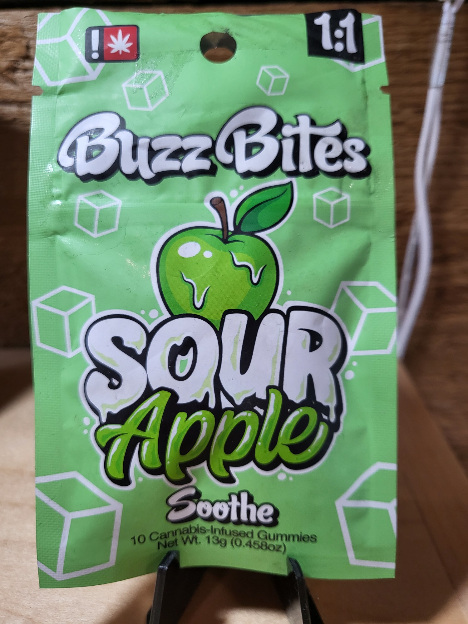 Photograph of product: Buzz Bites | Sour Apple Soothe 1:1 TH-oui:CBD (Oui'd) Gummies | 10 pk