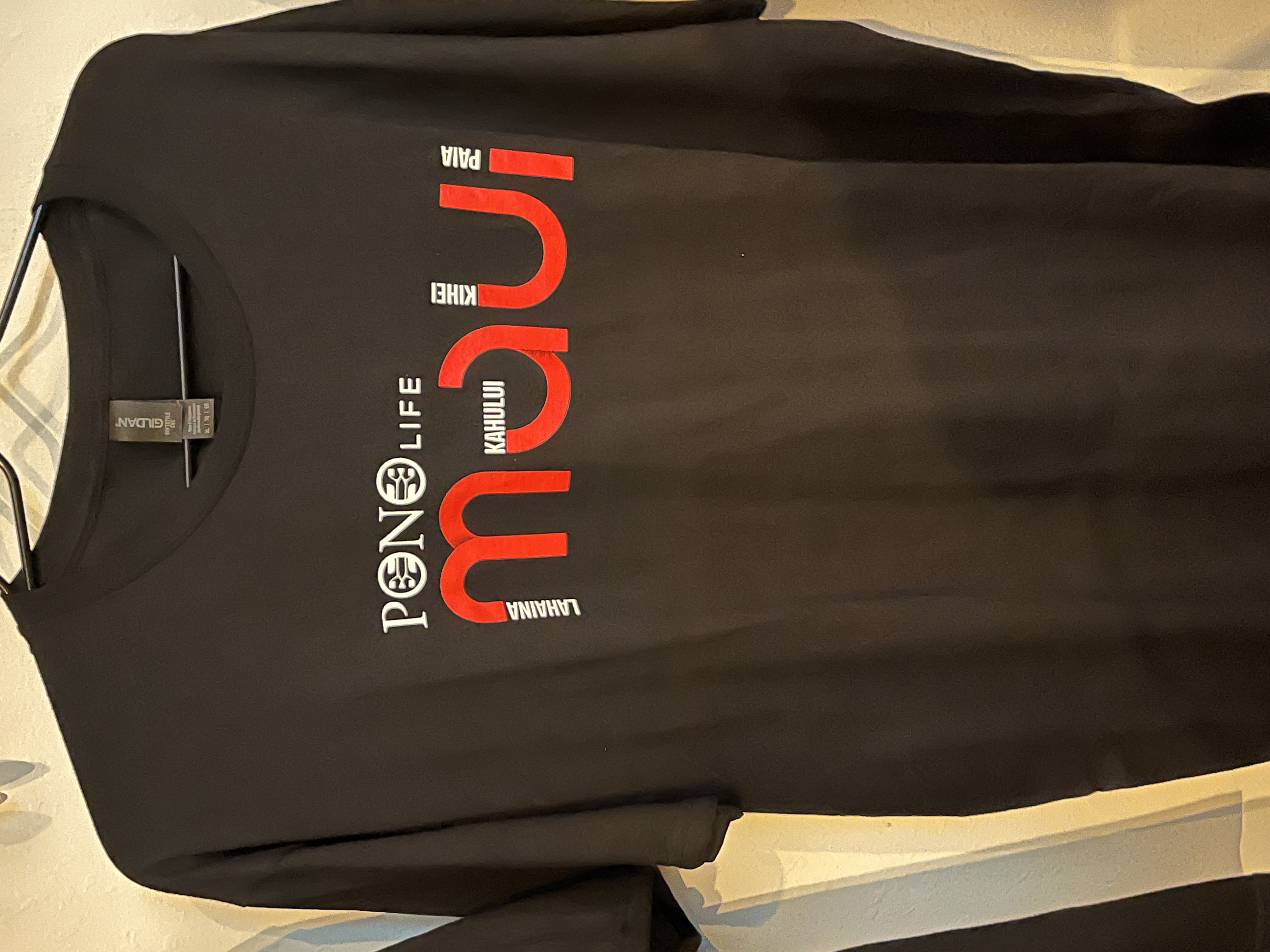 Photograph of product: 2024 Maui Pono Tee Shirts black and red