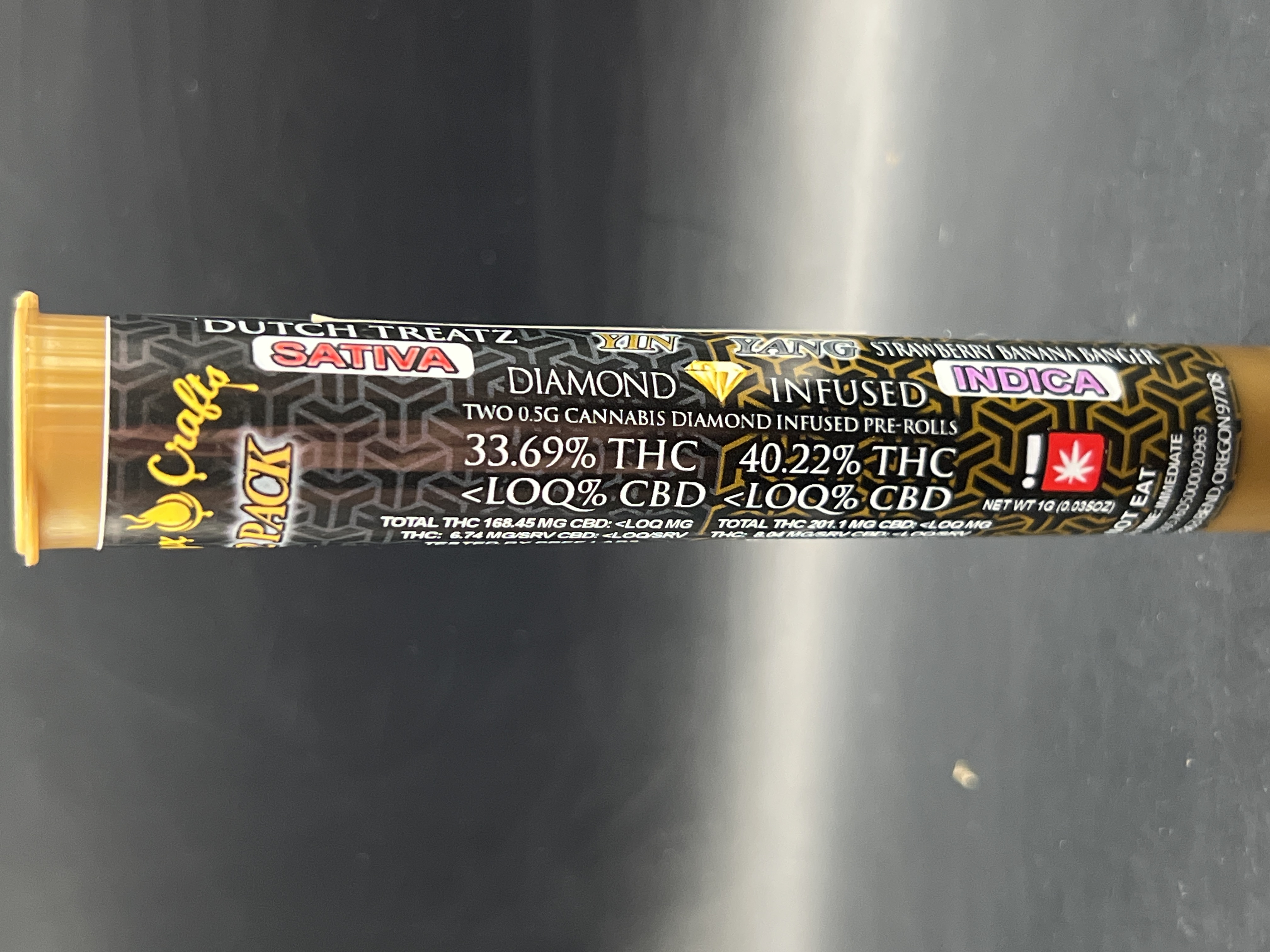 Photograph of product: Calyx Crafts Ying Yang 'Dutch Treatz' (S) 'Strawberry Banana Banger' (I) Infused Pre-roll 2 Pack