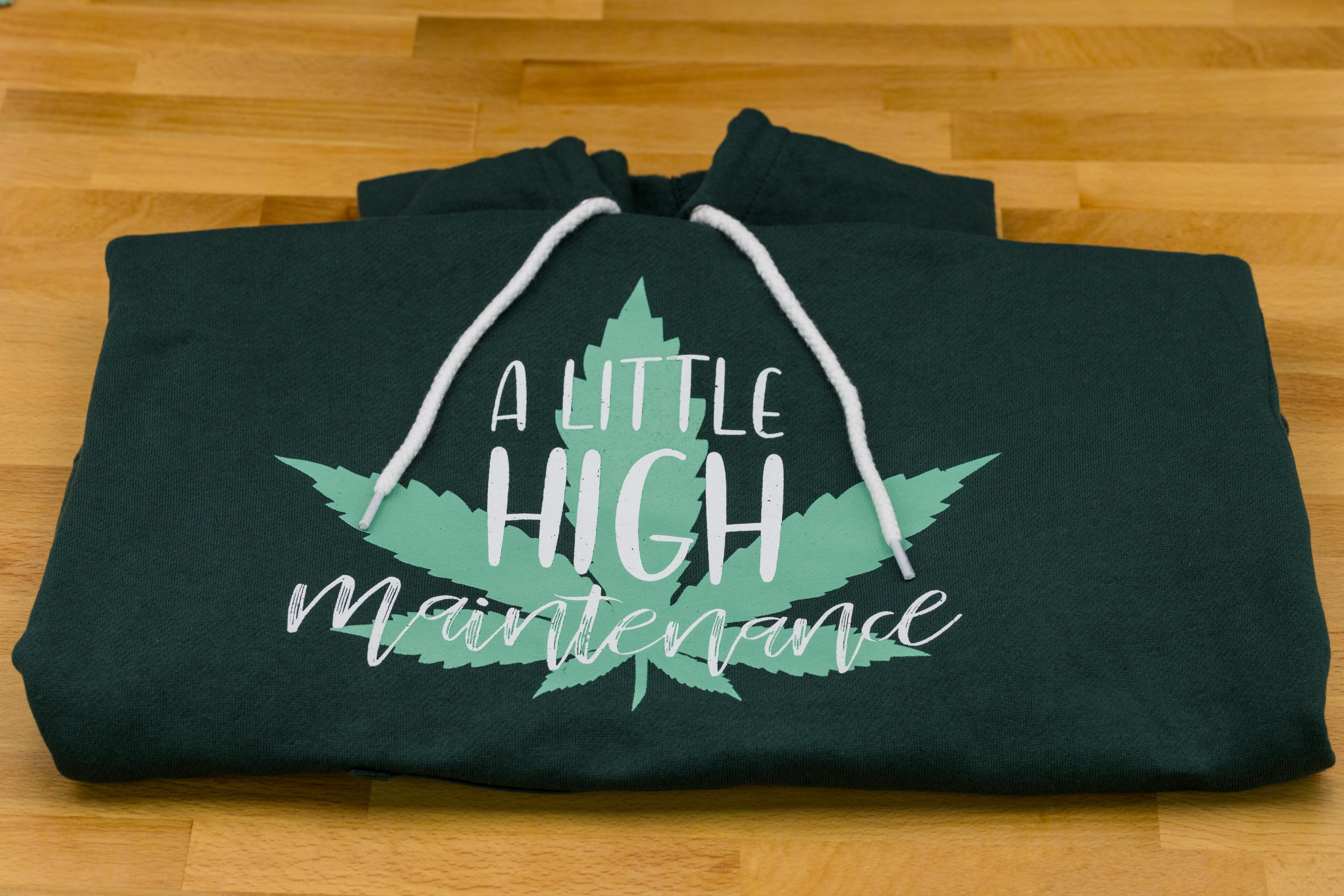 Photograph of product: Hoodie. XS. Green. Lightweight. A Little High Maintenance. Caniba
