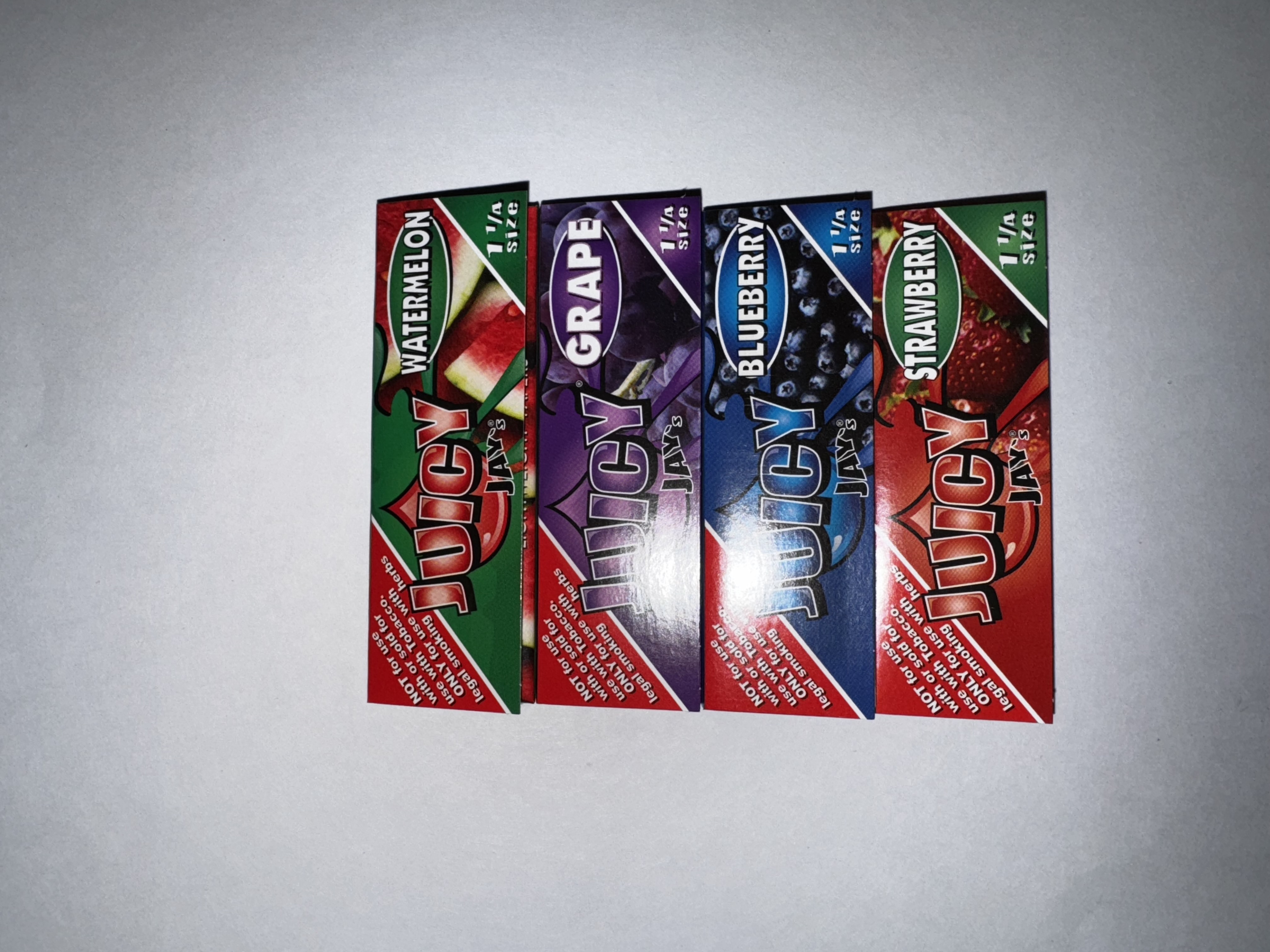 Photograph of product: Juicy Jay's - GRAPE 1 1/4 ROLLING PAPERS - Paraphernalia