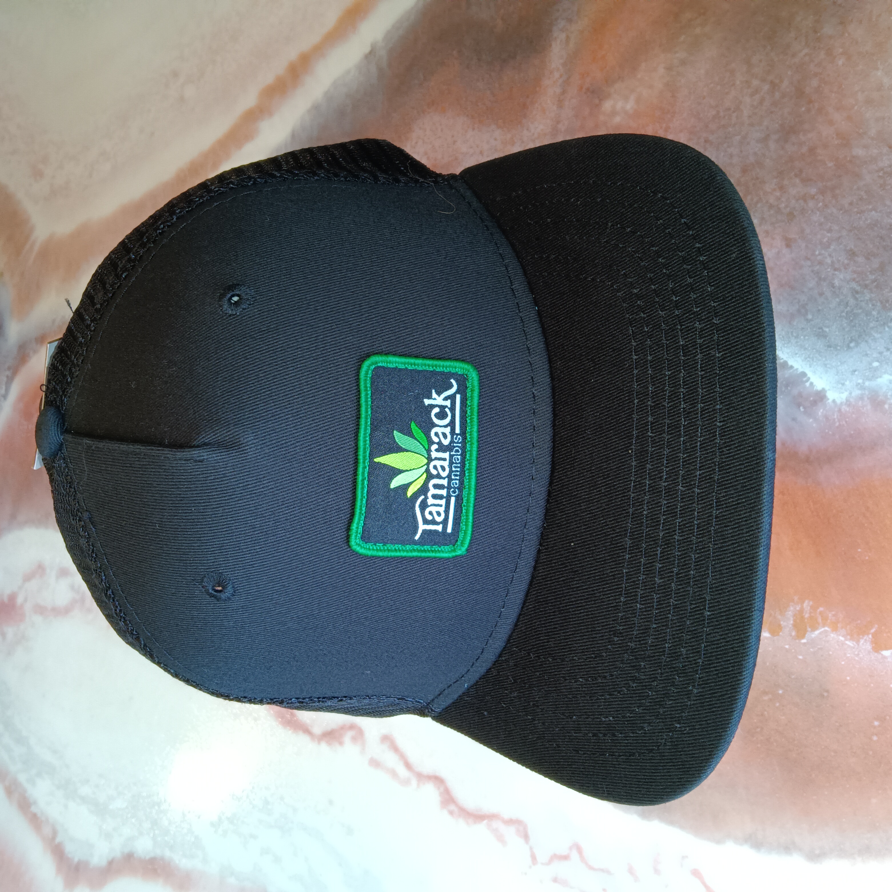 Photograph of product: Hat - Ball Cap - Black Cap w/Green Patch $25