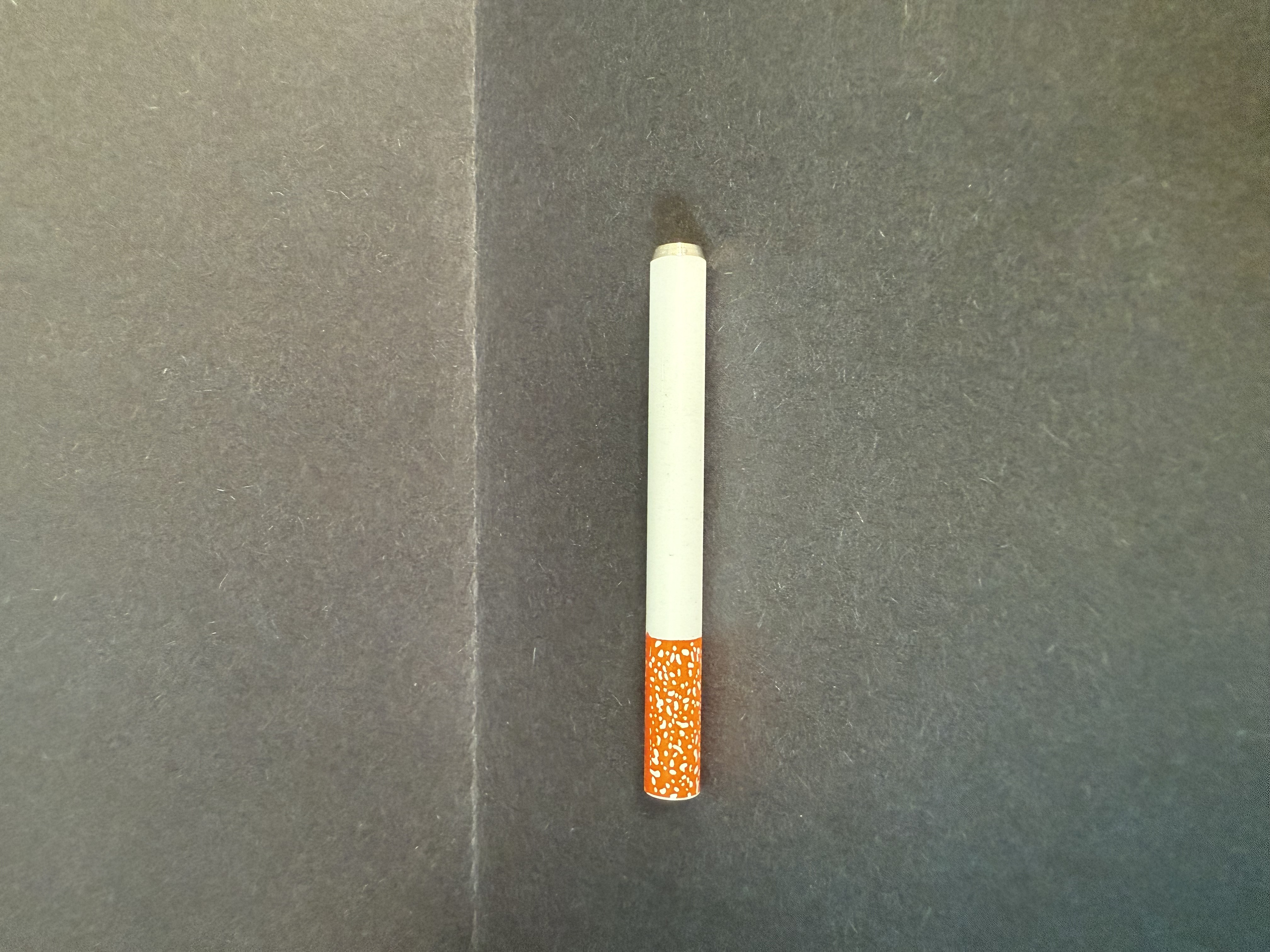 Photograph of product: Metal Imitation "Cigarette" Style One-Hitter