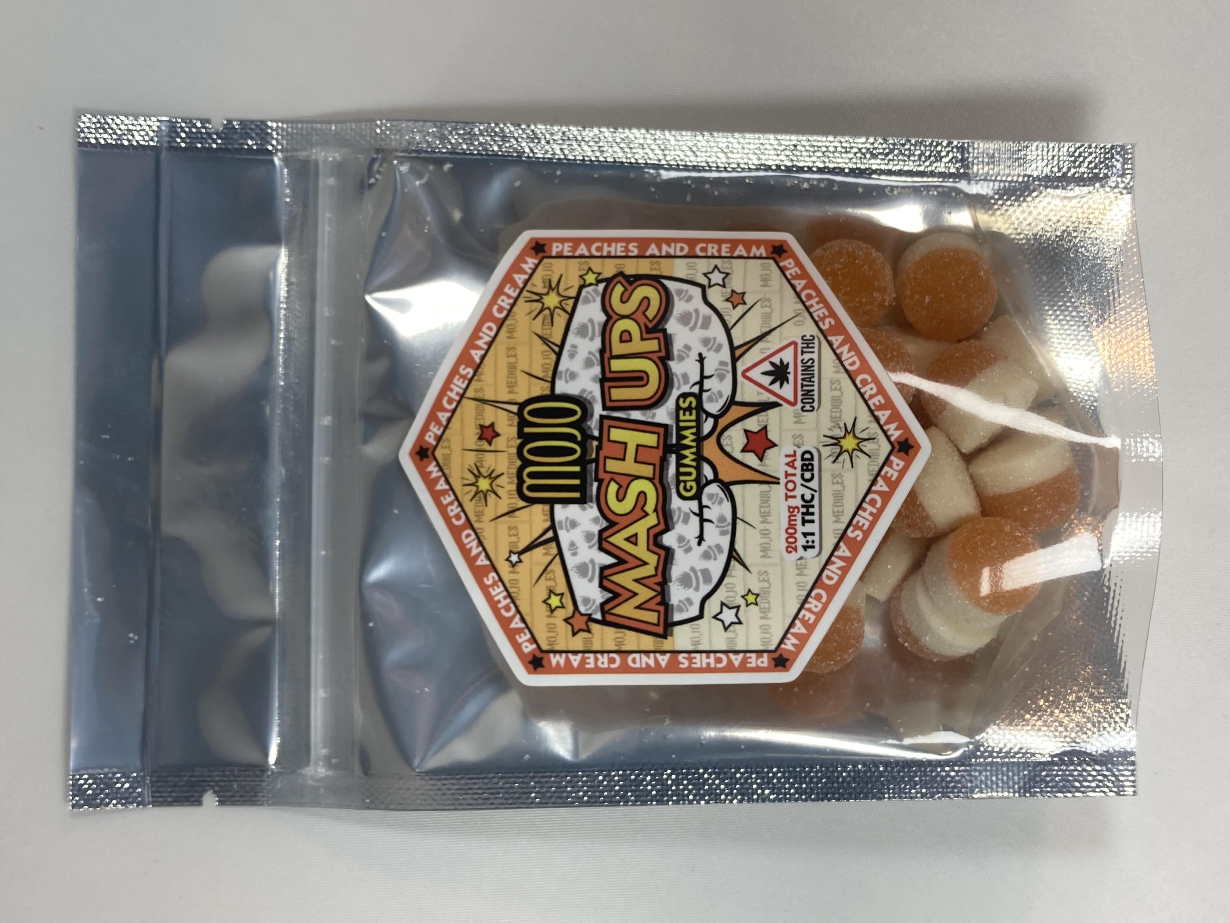Photograph of product: Gummies. Peaches and Cream. 1:1 200mg. Mojo Kitchen