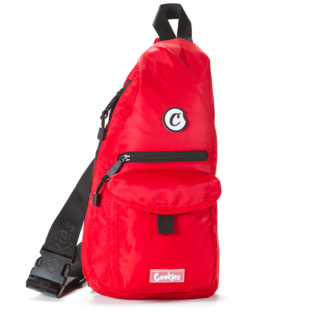 Photograph of product: Red - TRAVELER SMELL PROOF NYLON SLING BAG W/ PLASTIC ZIP PERS, LARGE MAIN COMPARTMENT, FRONT FLAP POCKET & STASH ZIPPER POCKET