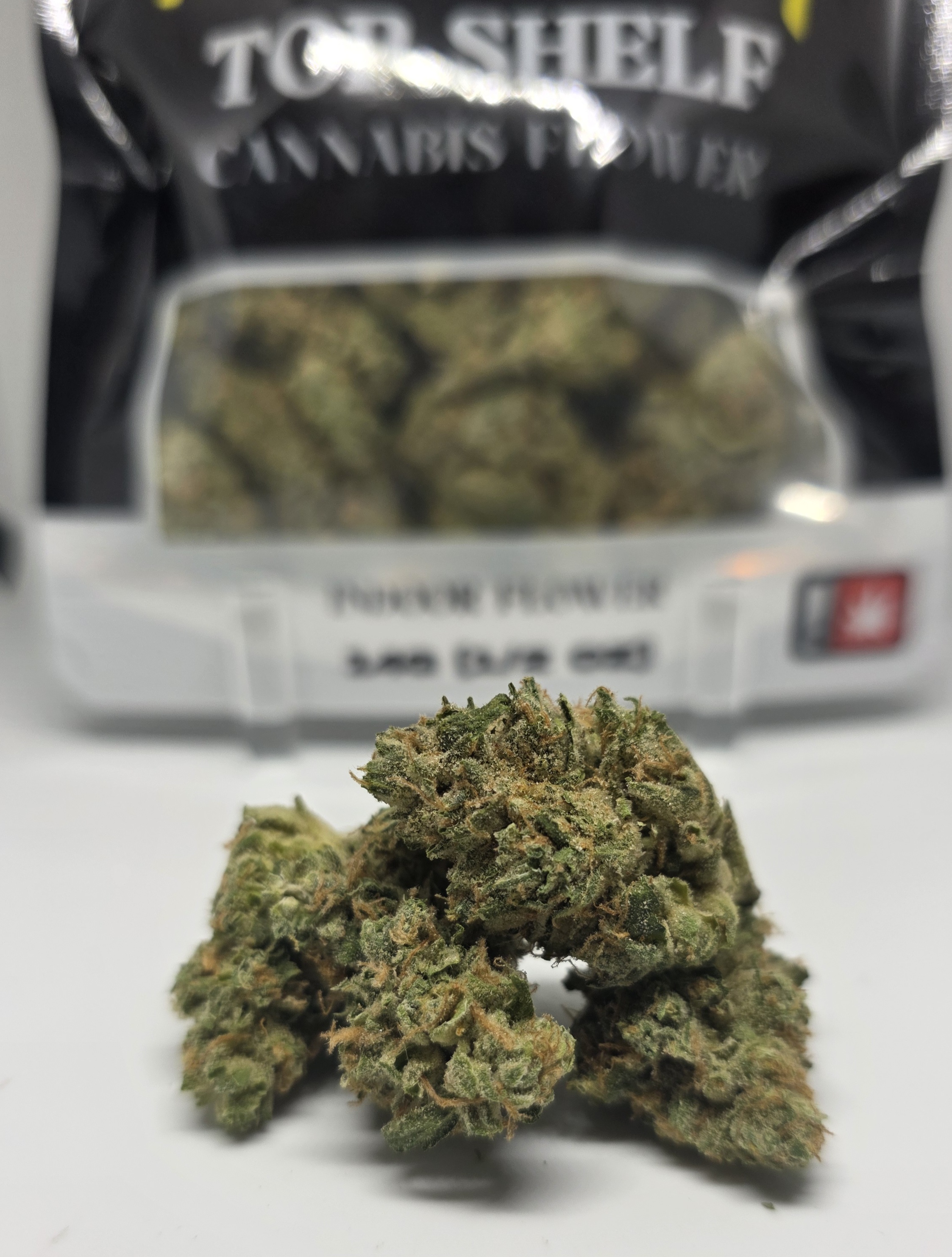 Photograph of product: MNG TOP SHELF - FLOWER - 14G - Oui'd - RAINBOW GUAVA