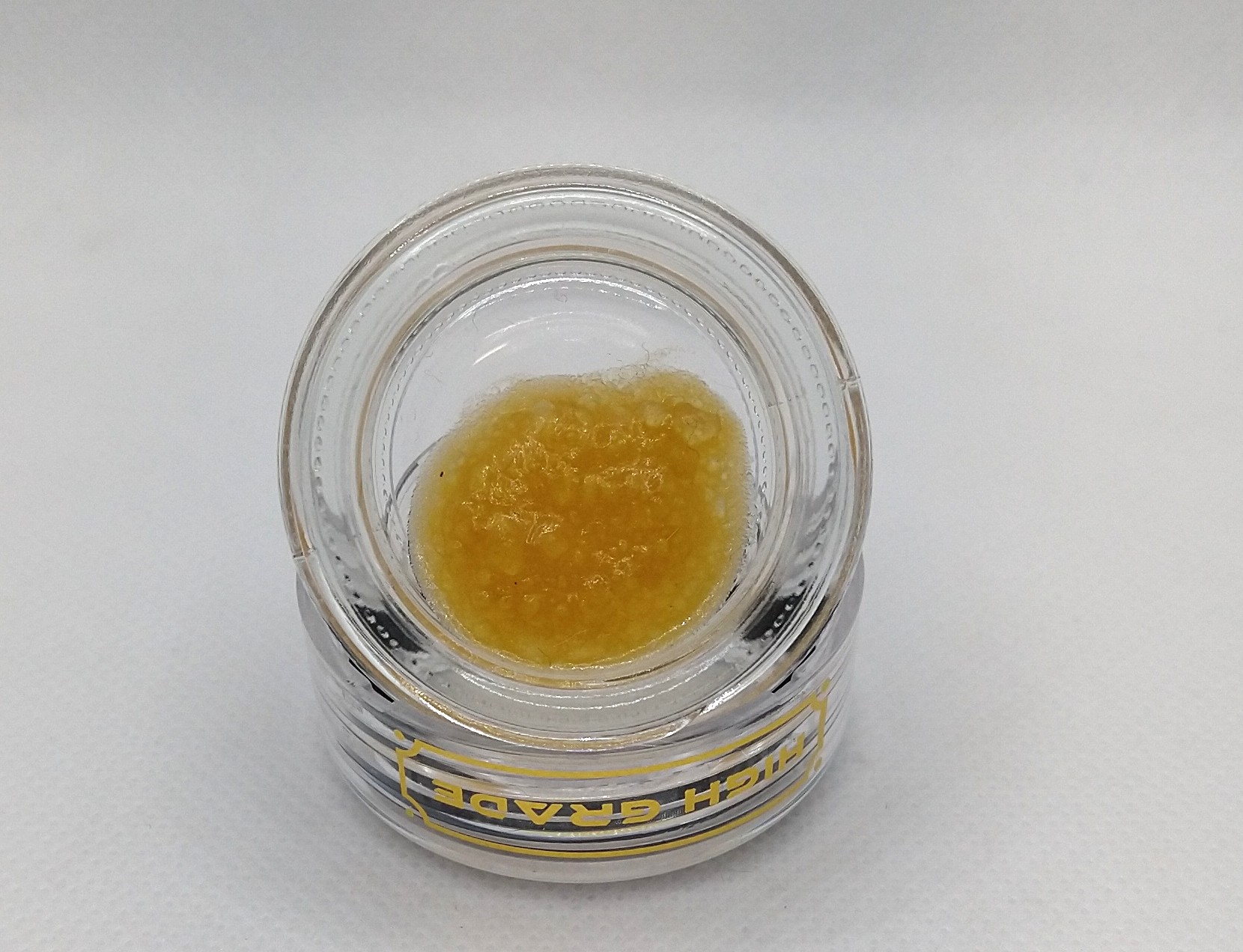 Photograph of product: High Grade | Wizard Essence | Live Resin Applesauce Concentrate Hybrid