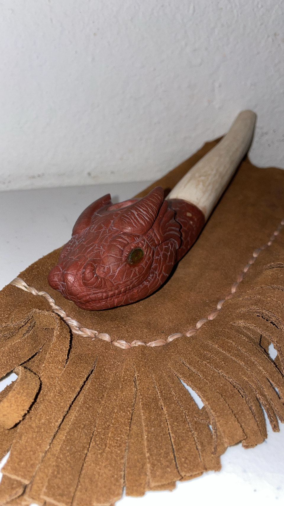 Photograph of product: Dale Griffith - Dragon's Head (carved from pipestone w/ peridot eyes and antler stem)
