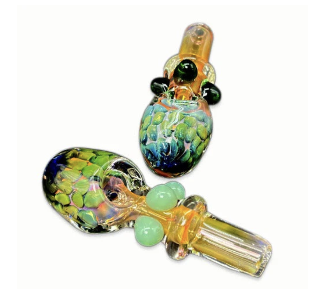 Photograph of product: 5" Growing Head Gold and Pink Hand Pipe