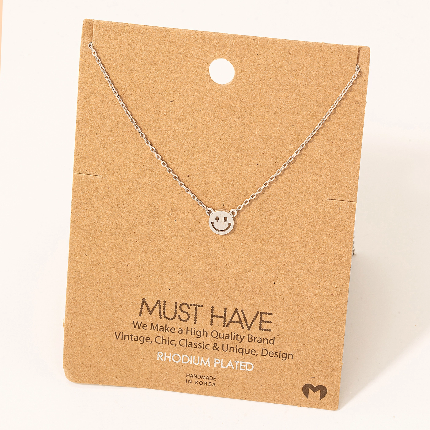 Photograph of product: Mini Smiley Face Charm Necklace - Silver