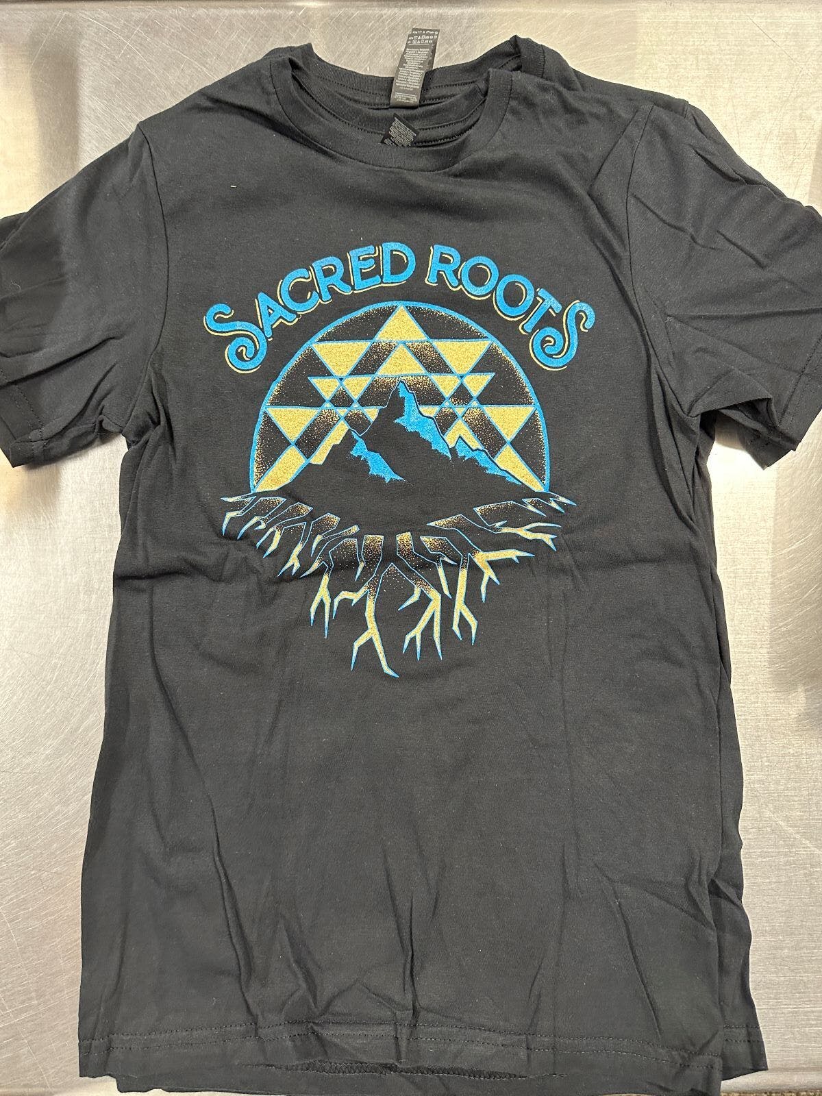 Photograph of product: Black Shirt w/ Blue and Gold Logo M