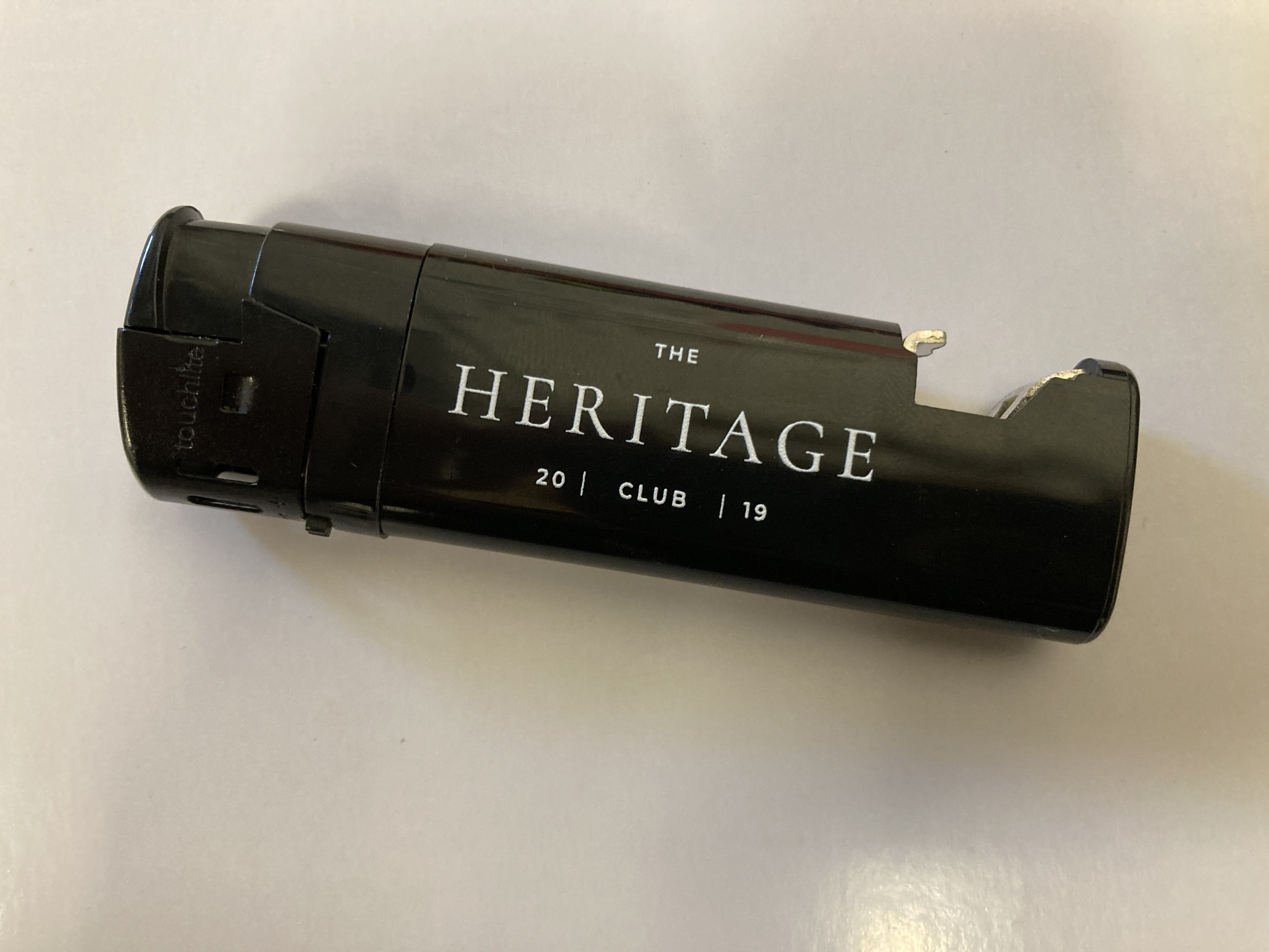 Photograph of product: Bottle Opener Lighter - The Heritage Club