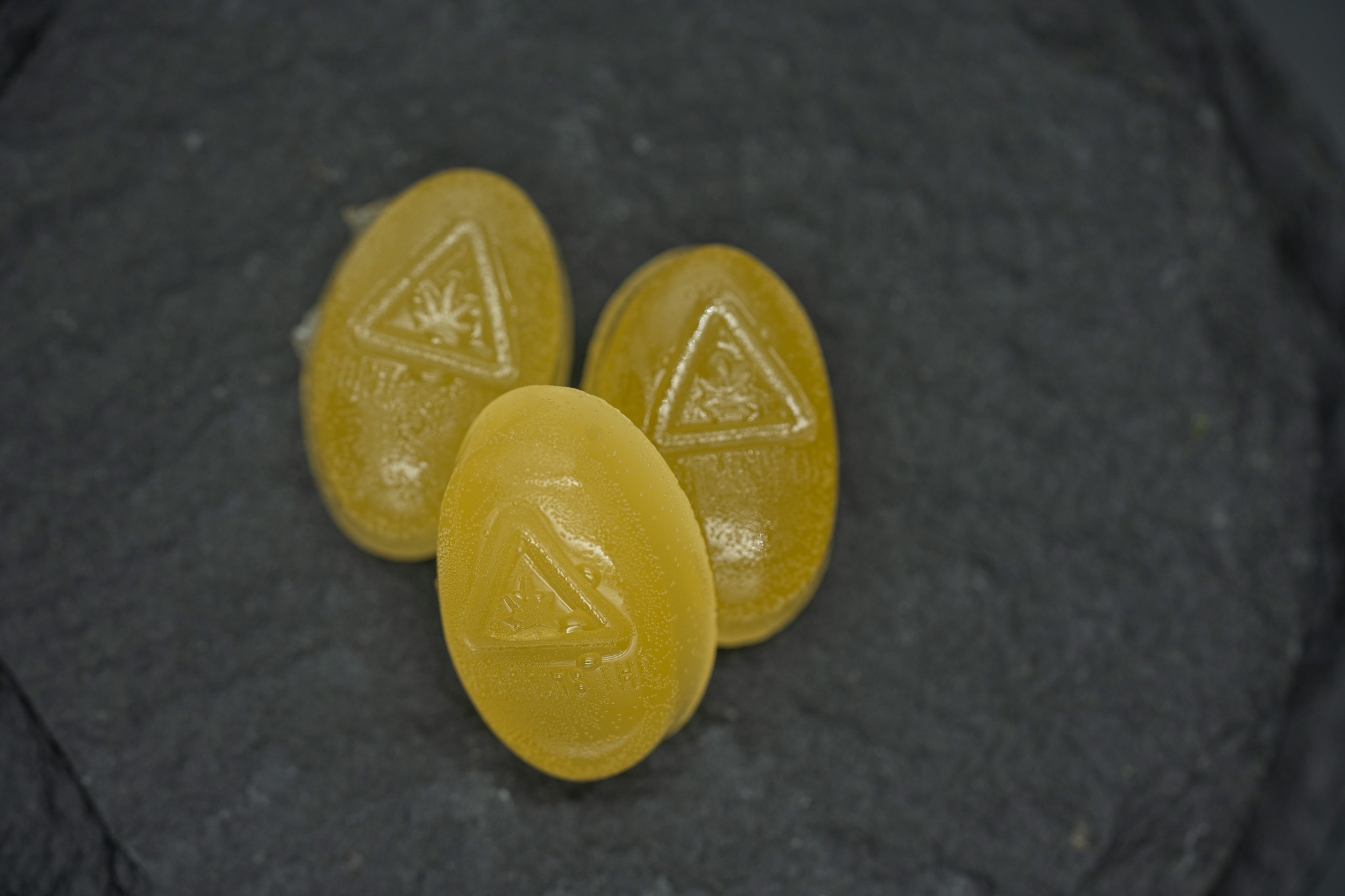 Photograph of product: Landrace au chocolat Co. - Pineapple Orange Caramel GMO au chocolat Rosin Gummies 100mg