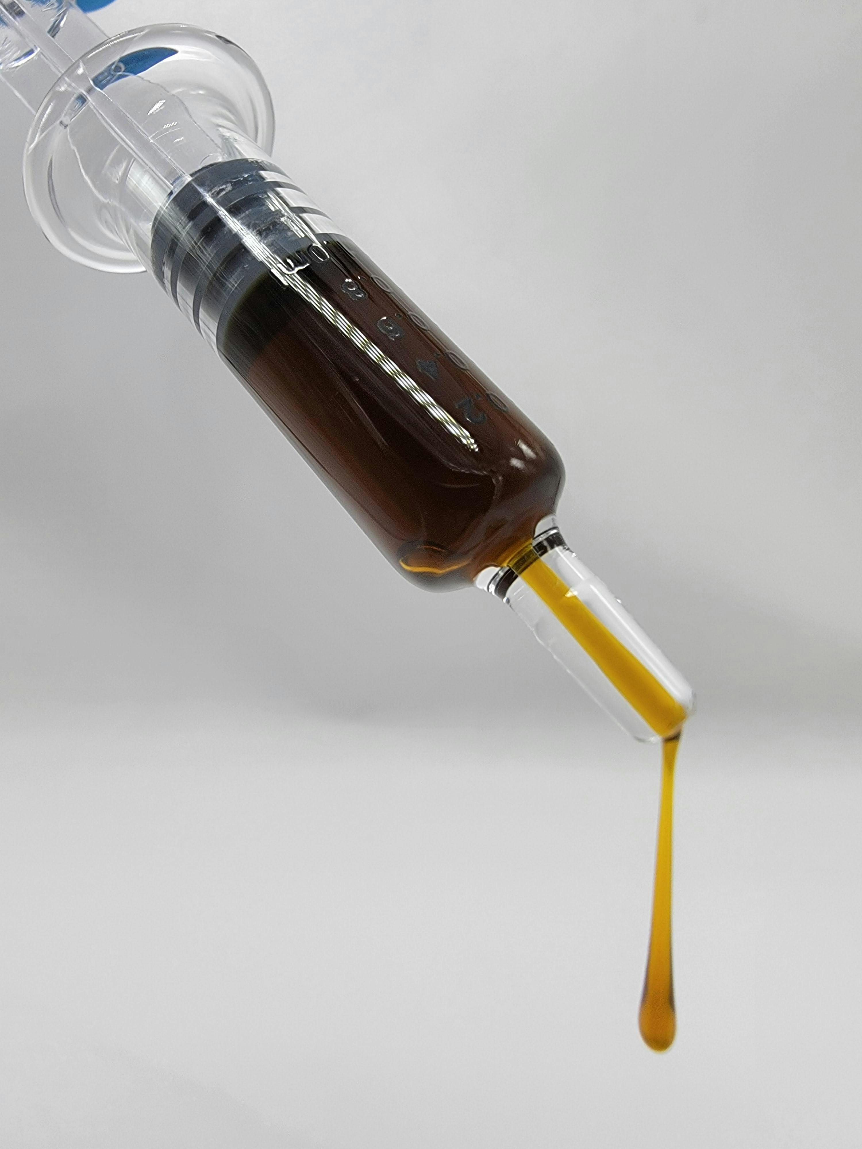 Photograph of product: HEARTLAND LABS | FECO SYRINGE | OIL | 1G | Oui'd