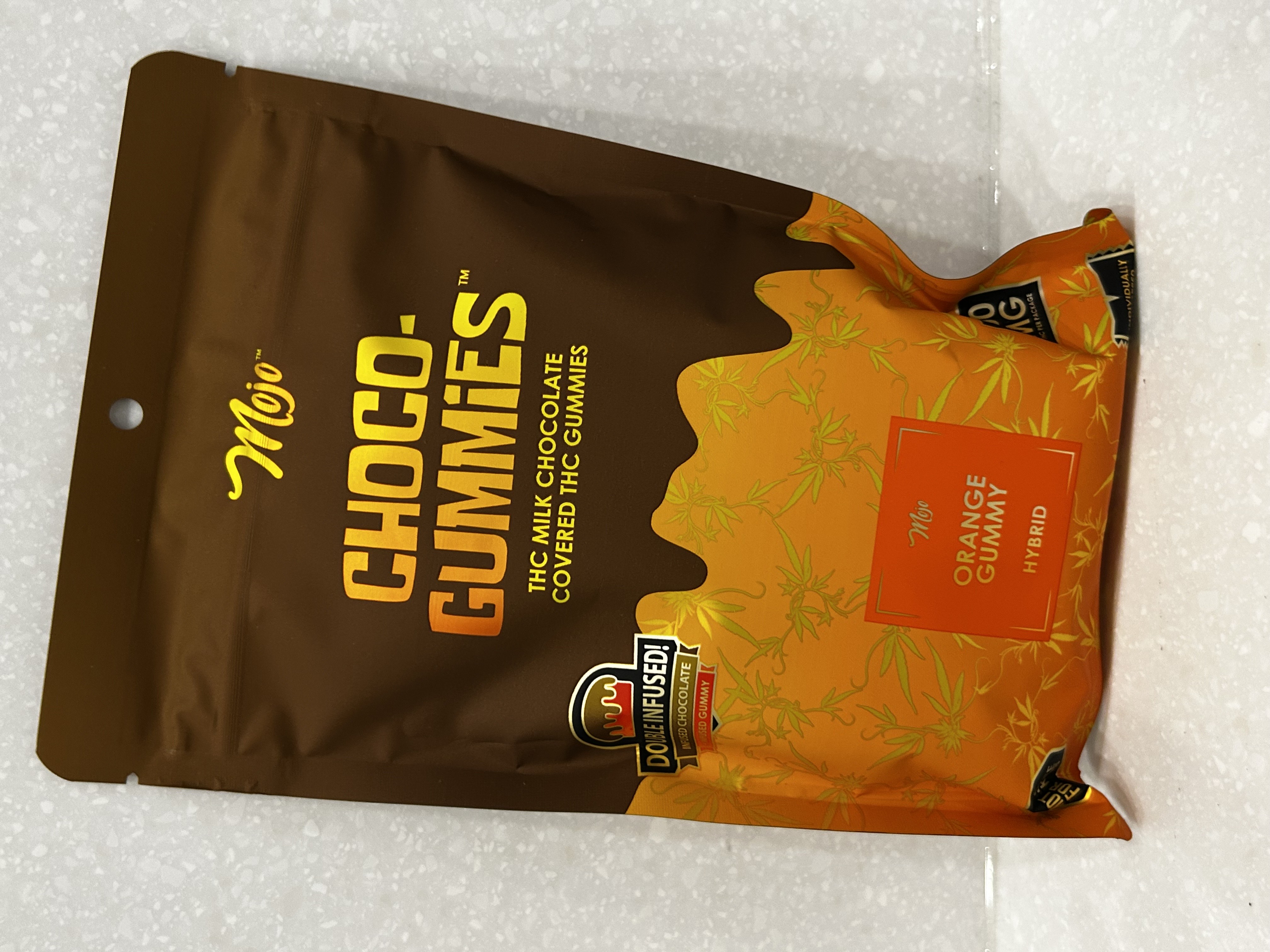 Photograph of product: Mojo | Chocolate Covered Gummy | Milk Chocolate Orange | 200mg