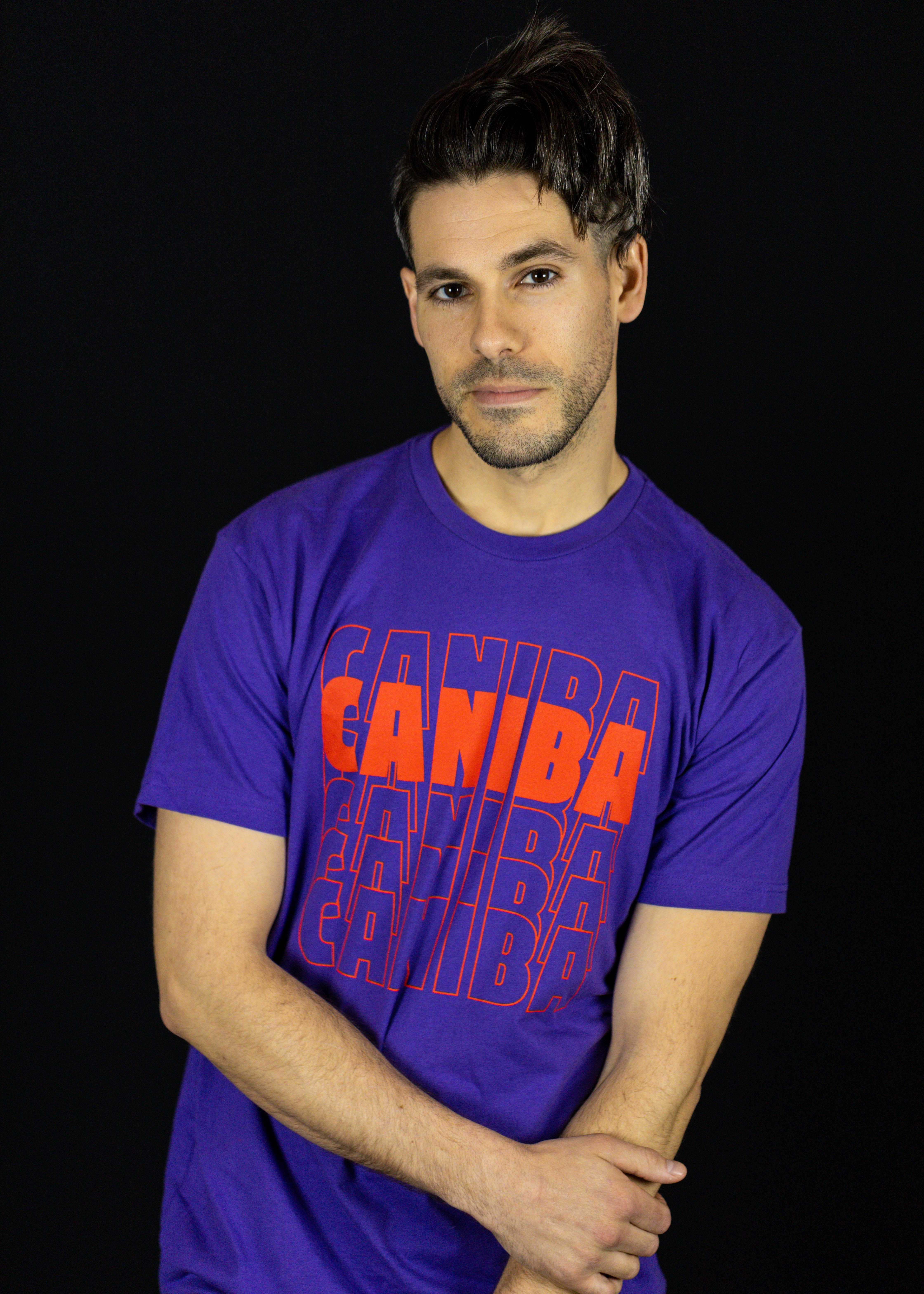 Photograph of product: T-Shirt. XS. Purple. Caniba Text. Caniba