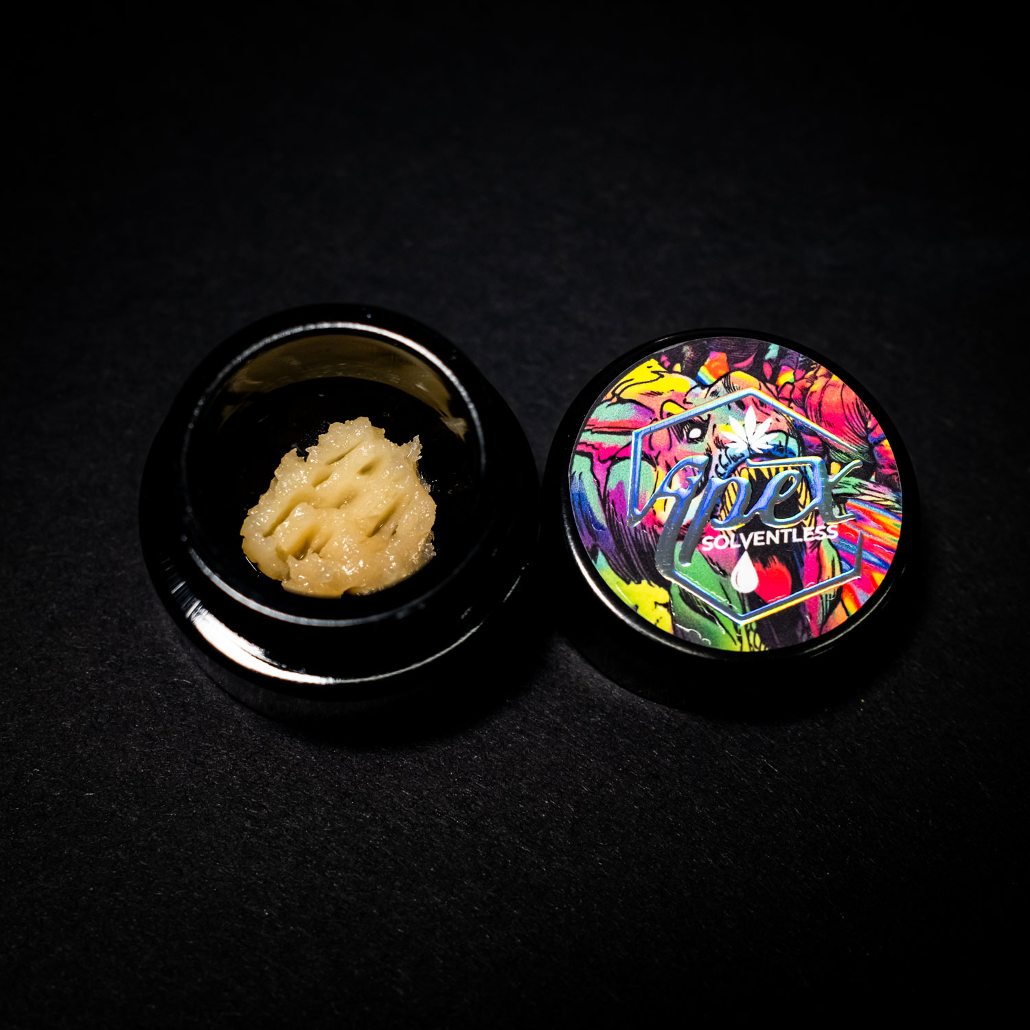 Photograph of product: Apex Solventless - Pixie Stick Punch | Grape Zoda x Papaya Thumbprint au chocolat Rosin (73-119u)