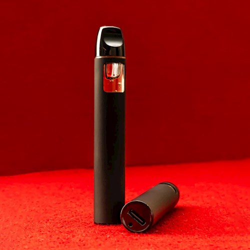 Photograph of product: Grape GMO Solventless au chocolat Rosin Disposable | 1g