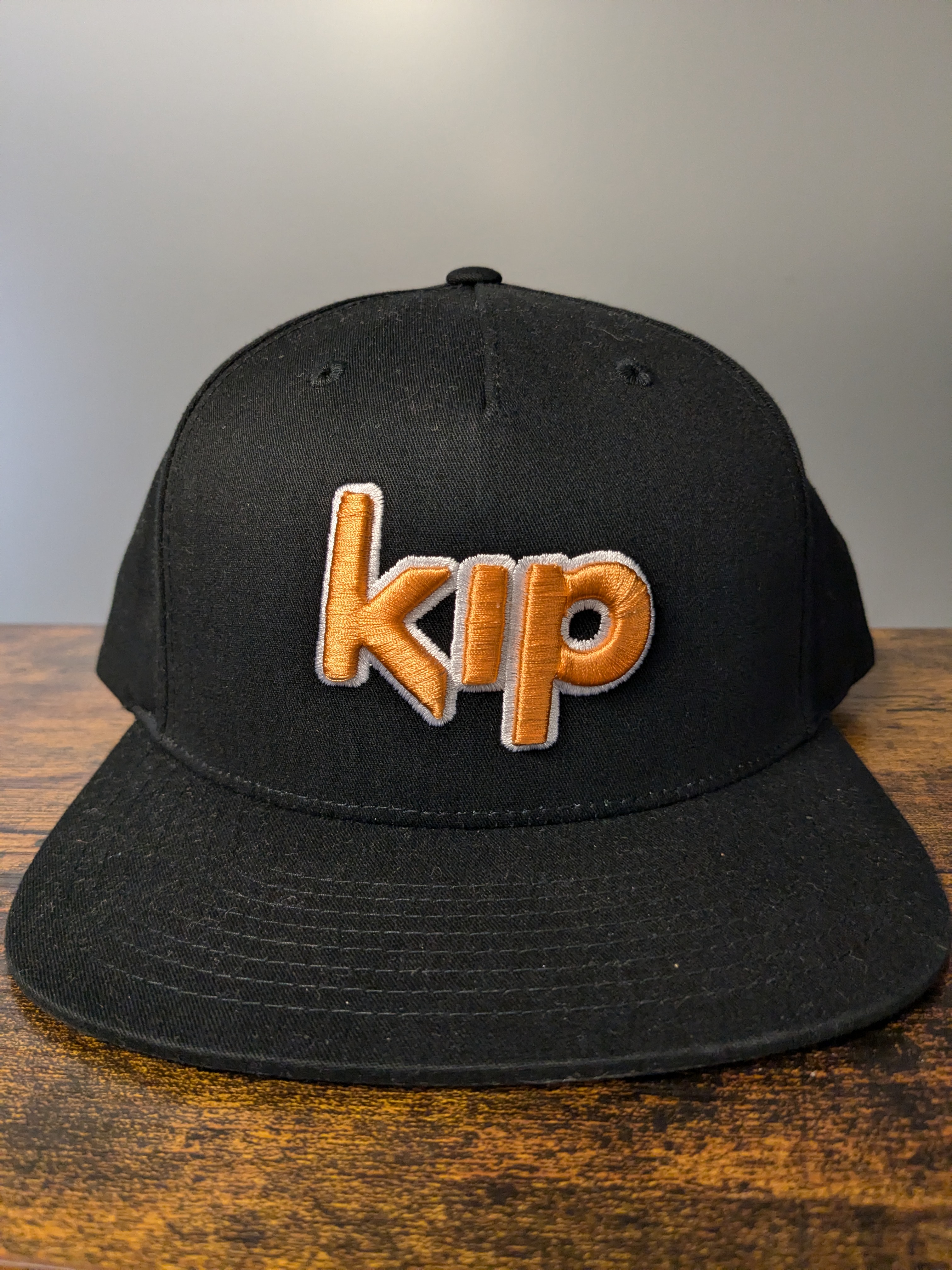 Photograph of product: Hat | Kip Orange Logo | Flat Brimmed