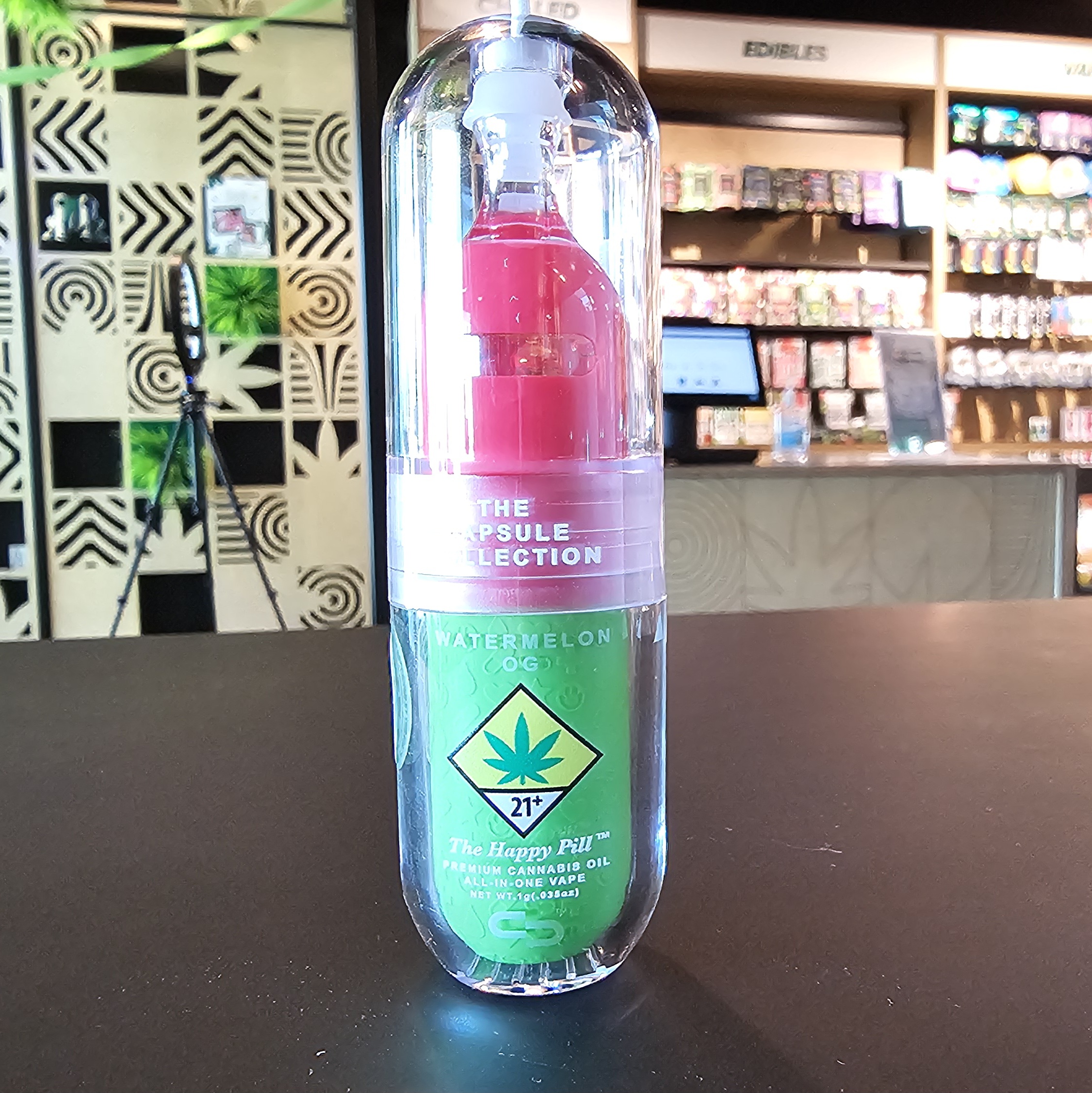 Photograph of product: The Capsule Collection - Watermelon OG  (H) - Vape - Dist. Dispo - 1g