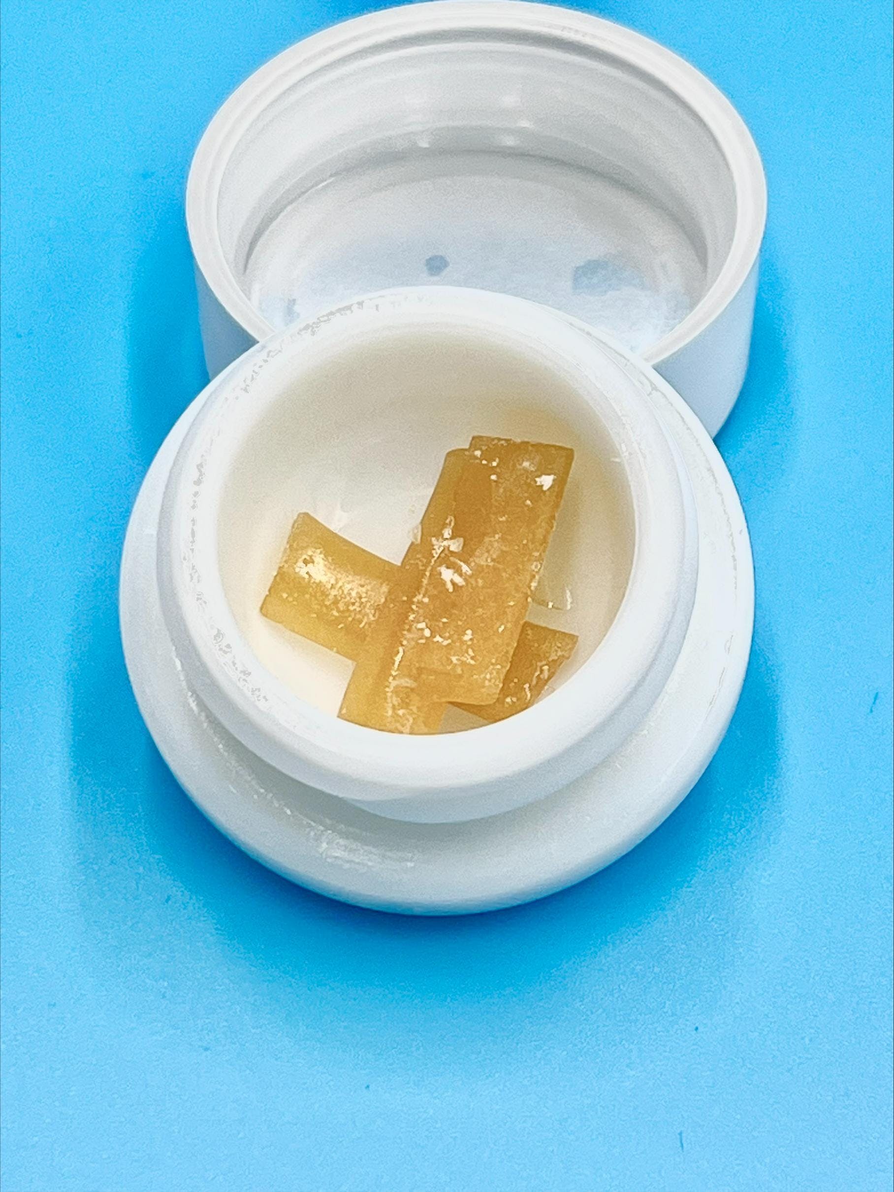 Photograph of product: TS - 1g LIVE ROSIN FRESH PRESS - PEACH PIT