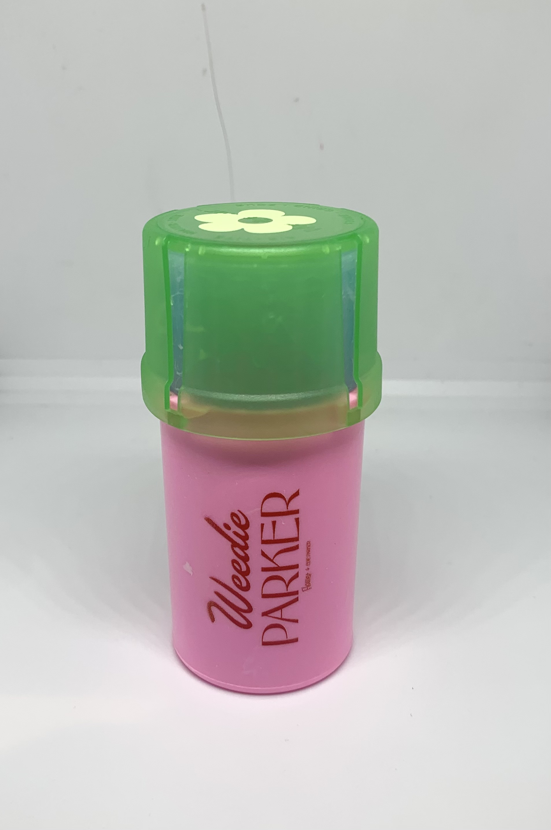 Photograph of product: "Pink" Grinder Case || Edie Parker