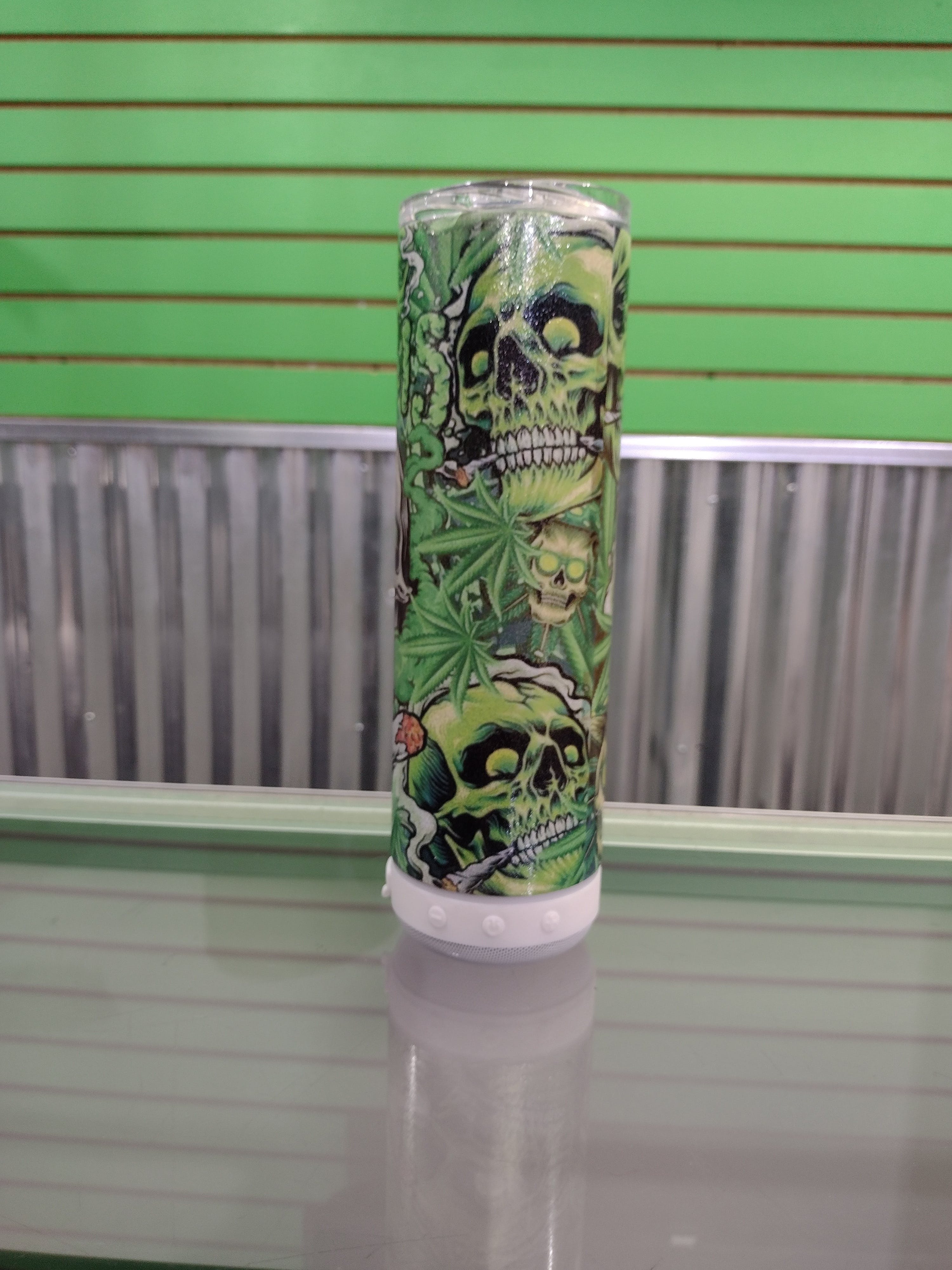 Photograph of product: 20oz Tumbler with Bluetooth Speaker- Skulls