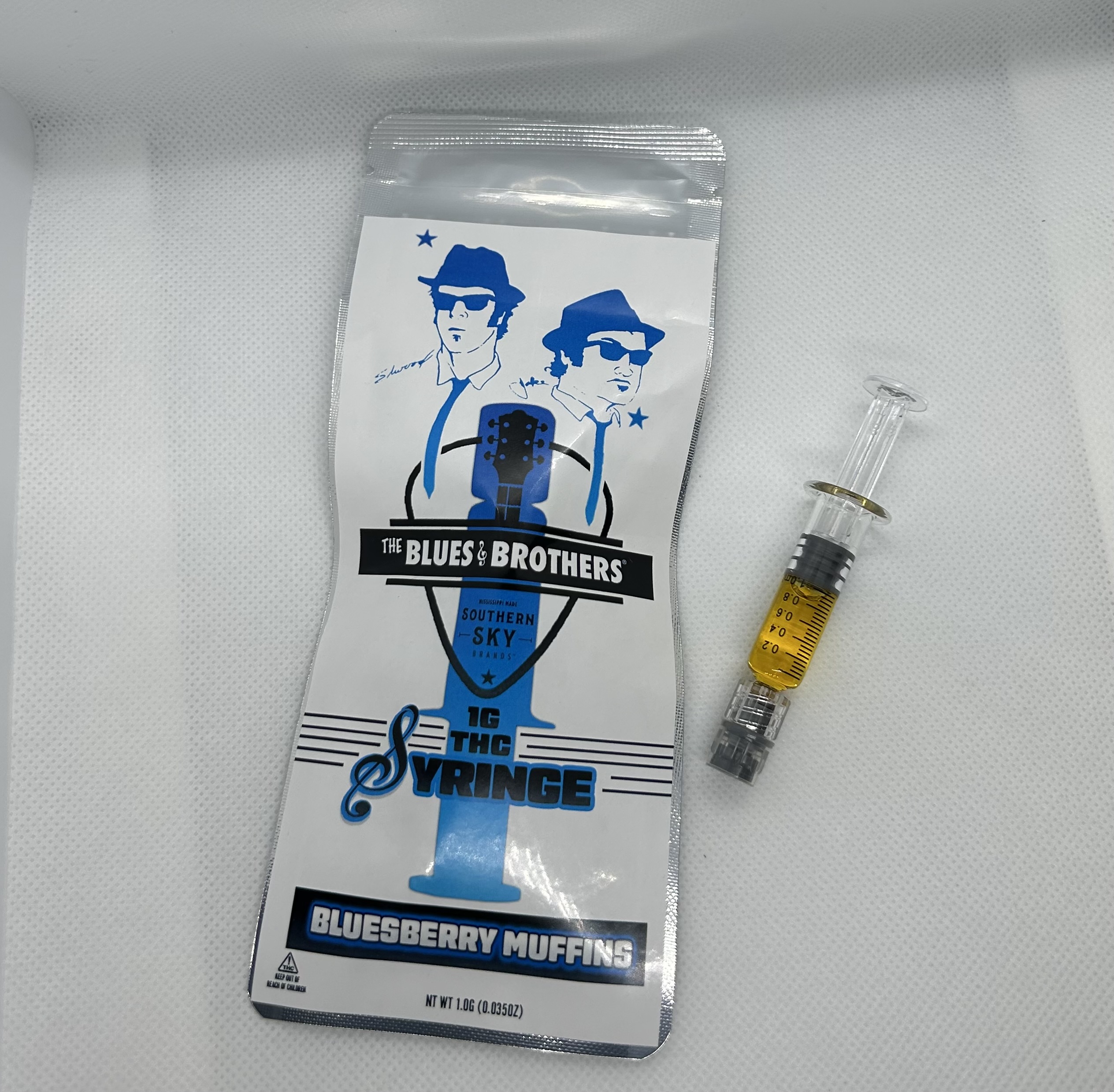 Photograph of product: Southern Sky | 1G Syringe | Belushi BluesBerry Muffin