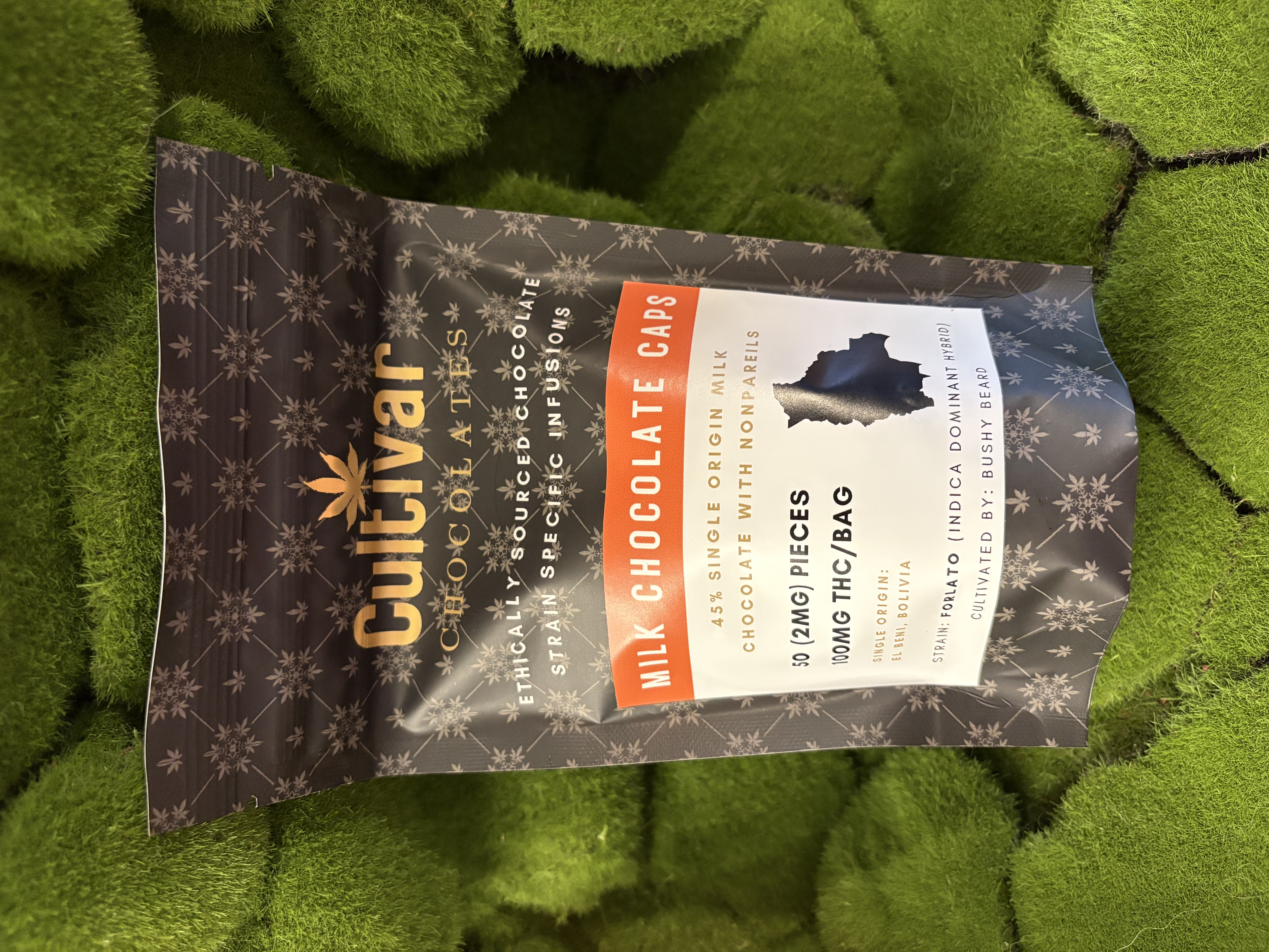 Photograph of product: 50mg Edible Pack | Milk Chocolate Caps | Cultivar Chocolates