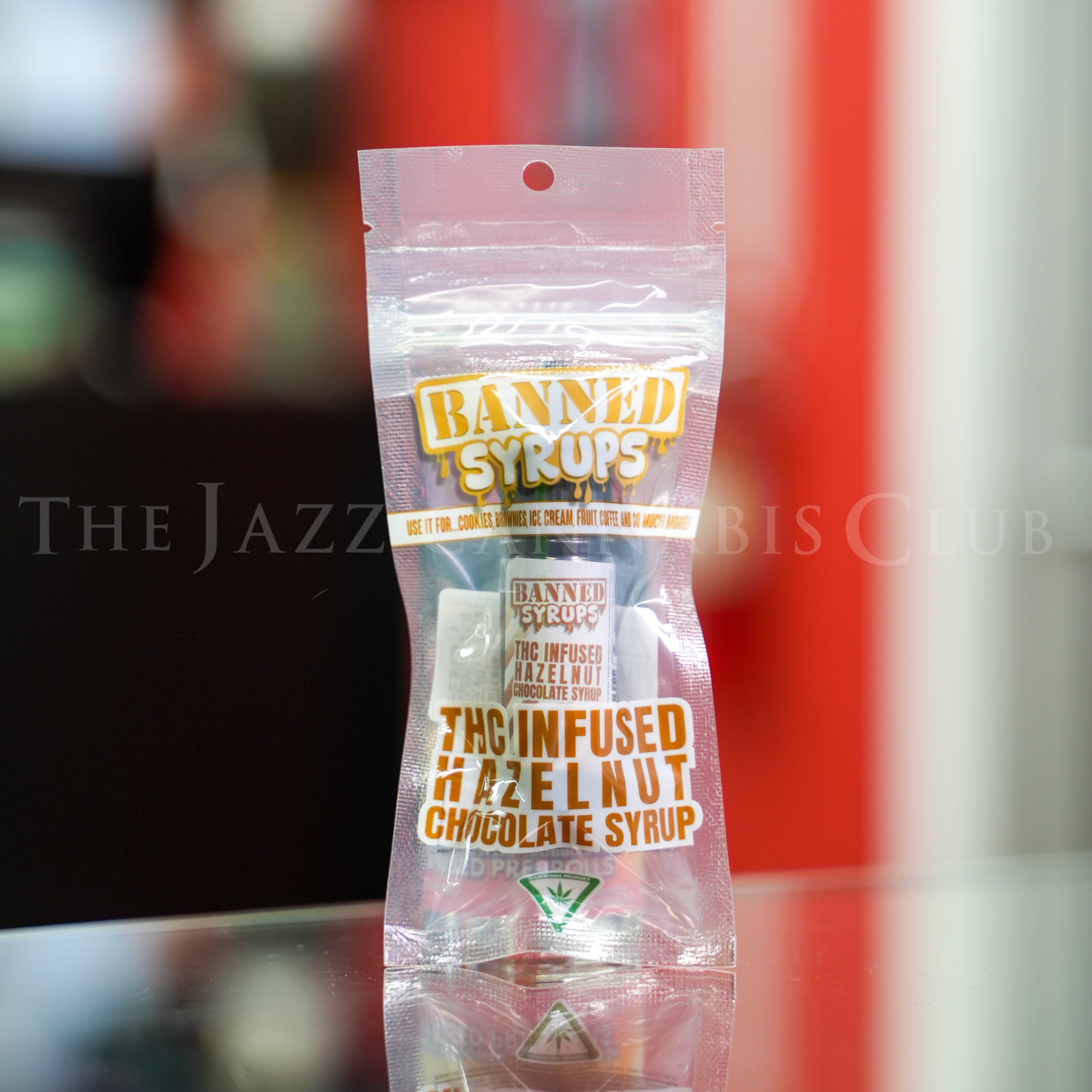 Photograph of product: Banned - Hazelnut - TH-oui Syrup 200mg