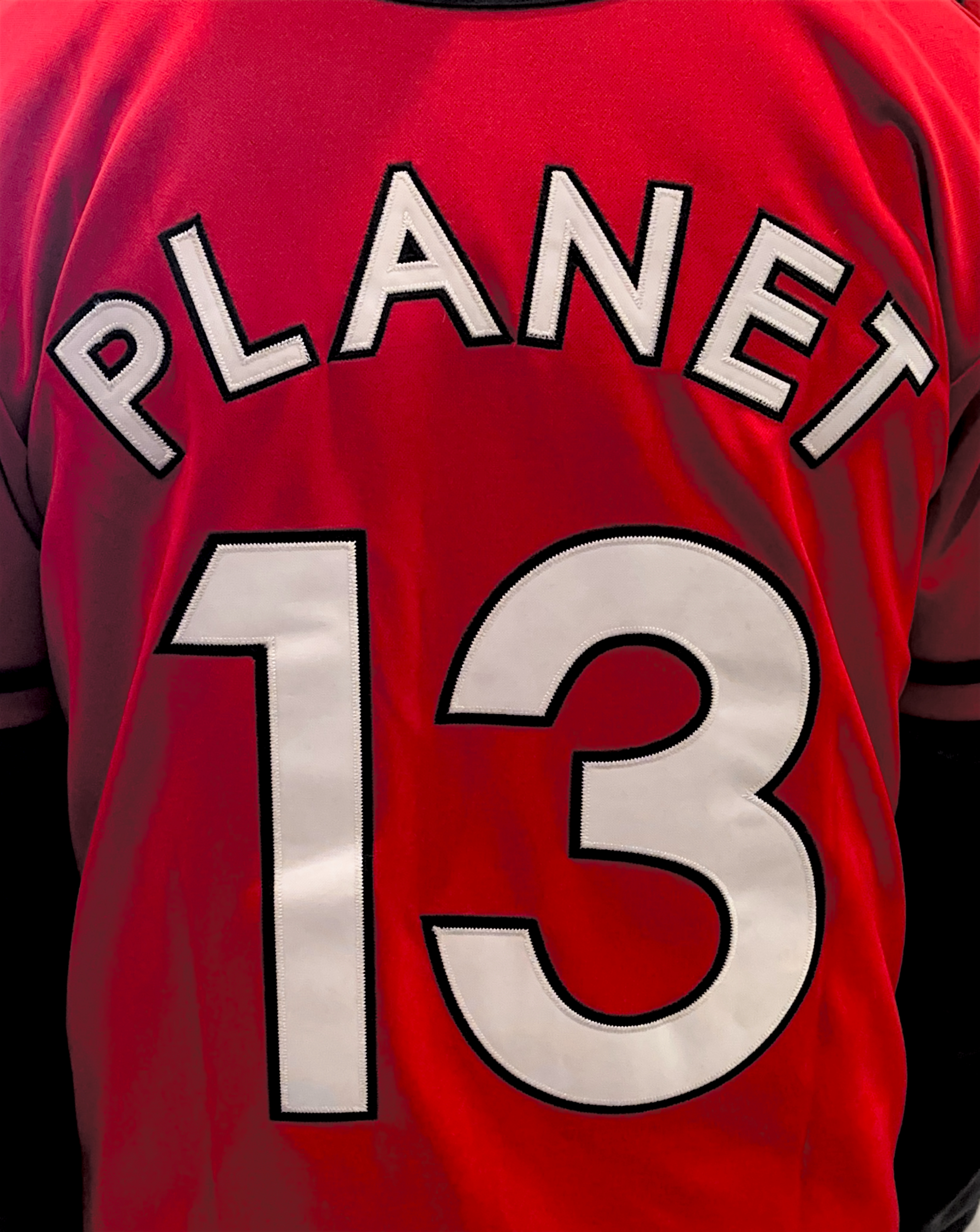 Photograph of product: Red/Black P13 Jersey Small