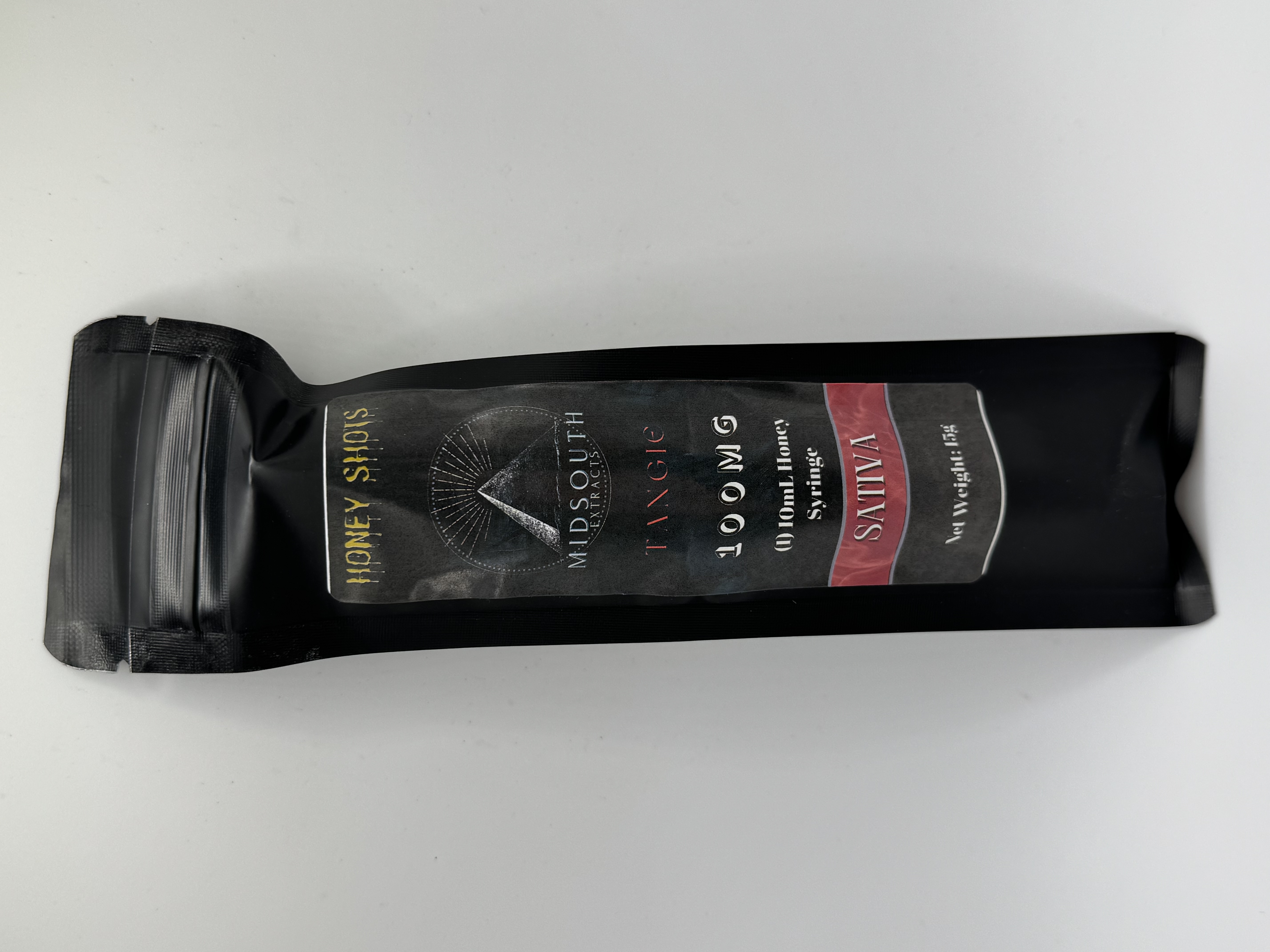 Photograph of product: Infused Honey Shots | Tangie | Oui'd | 100mg | Edibles