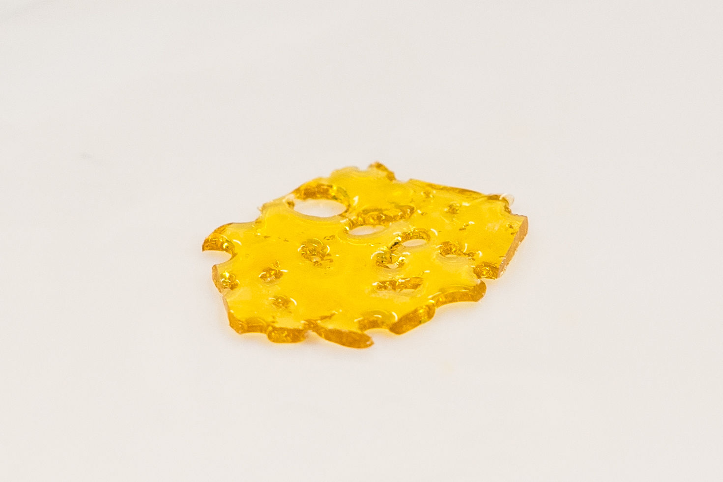 Photograph of product: Commerce City Kush Cured Resin Shatter 1g - Sunnies