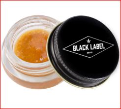 Photograph of product: Black Label | Concentrate |  AJs Sour Diesel | Badder | 1g-Oui'd