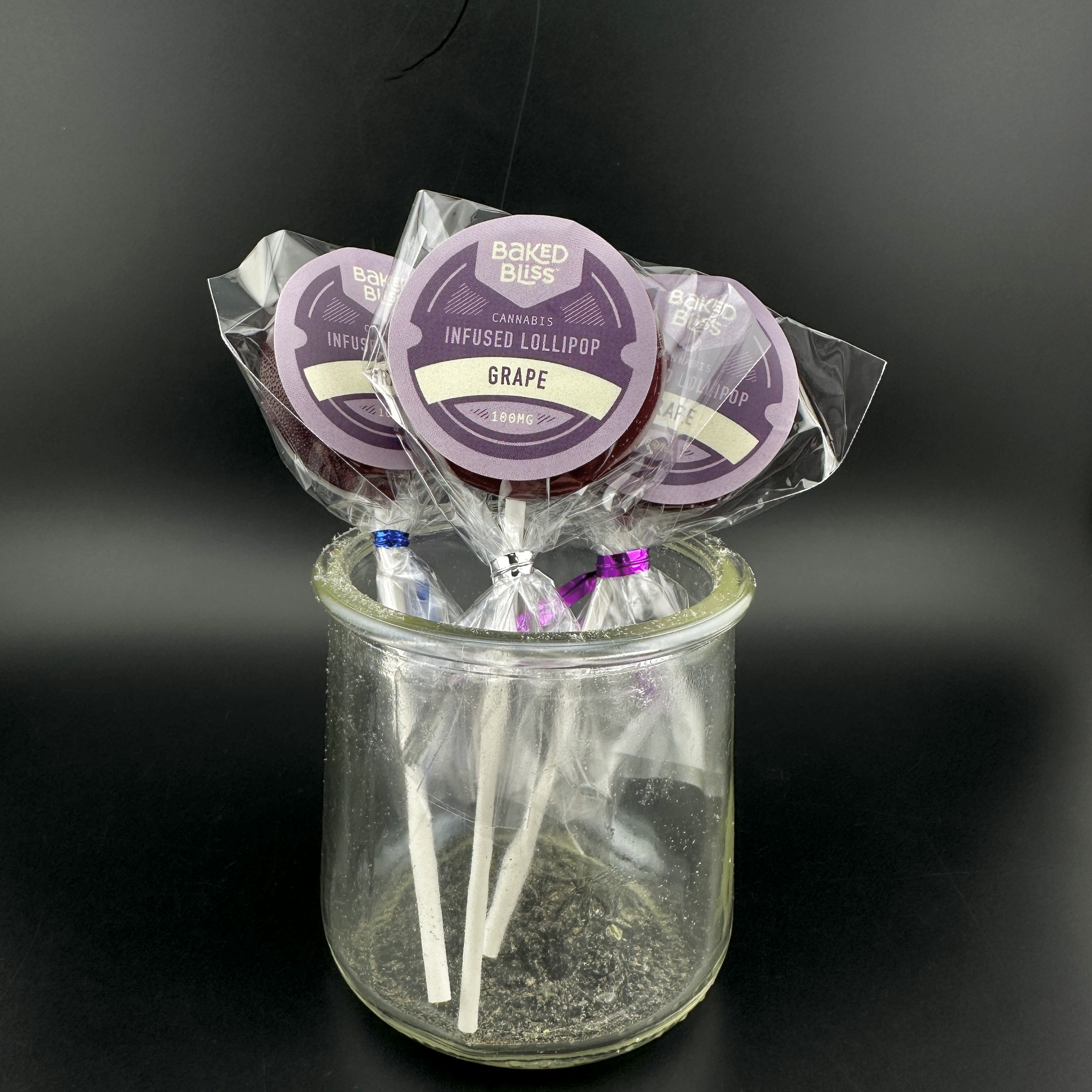 Photograph of product: 100mg Grape Lollipop | Baked Bliss