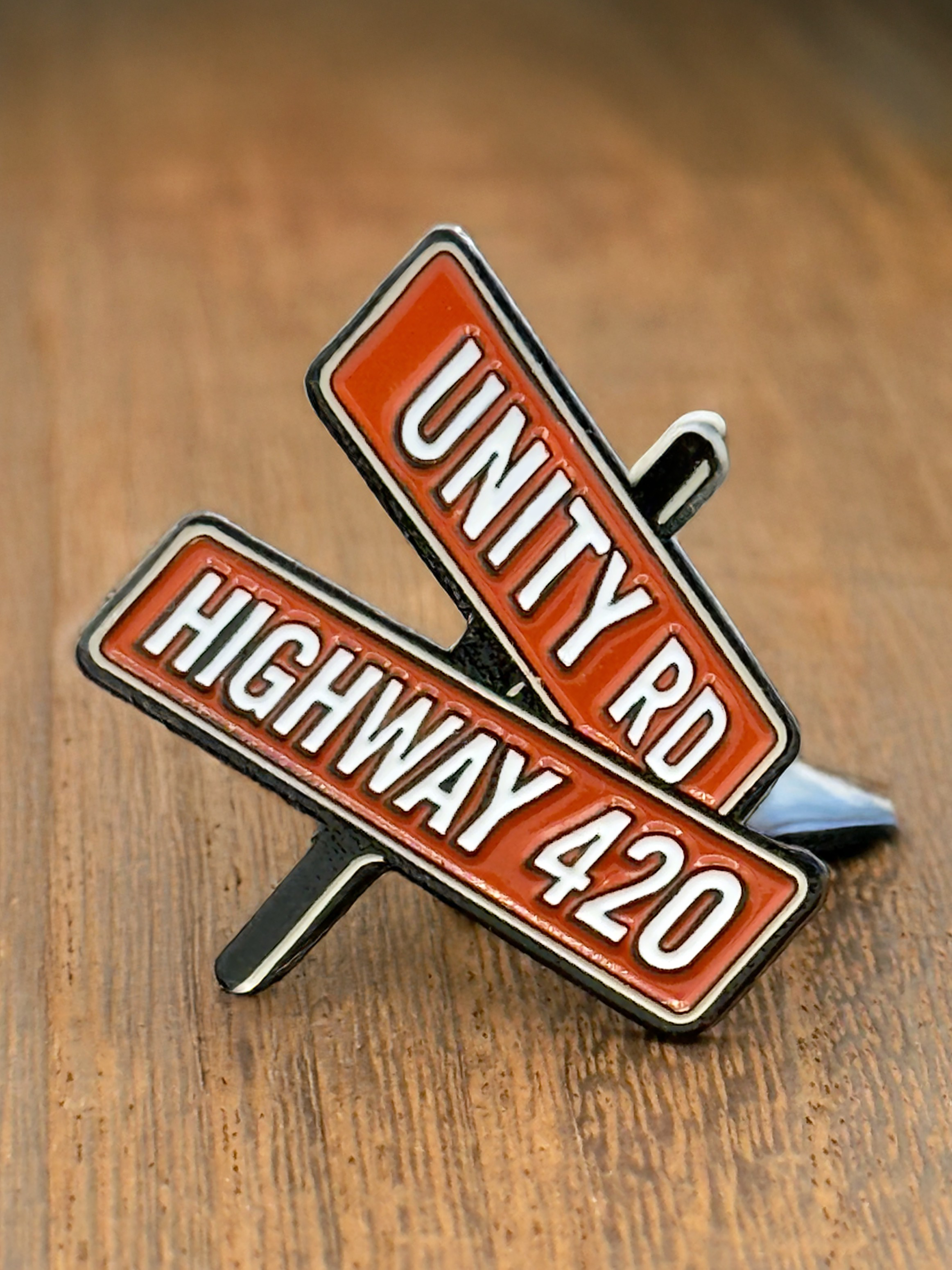 Photograph of product: Unity Rd - Highway 420 - Enamel Pin