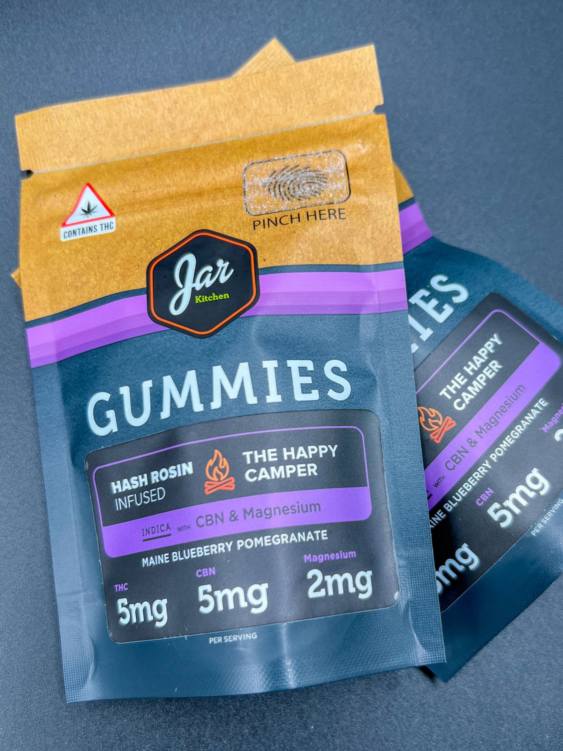Photograph of product: JAR | au chocolat Rosin Oui'd Gummies | Maine Blueberry Pomegranate 10mg | 200mg TH-oui 100mg CBN 40mg Magnesium