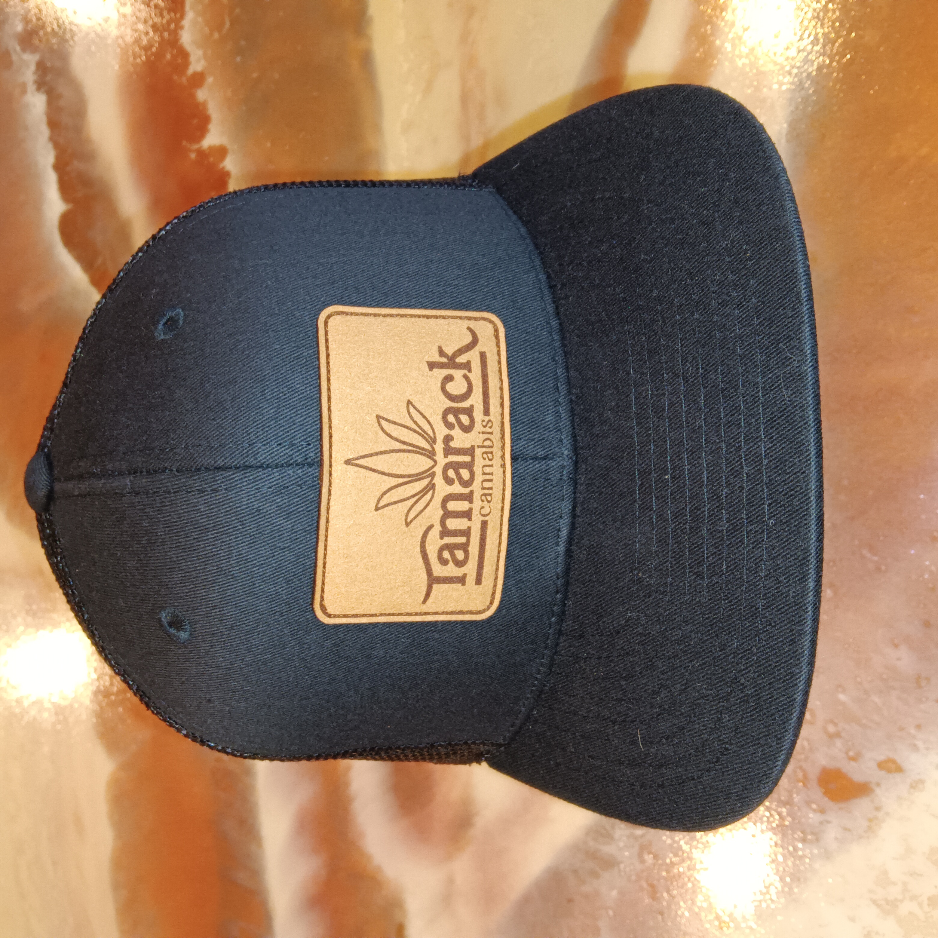 Photograph of Product: Hat - Ball Cap - Black Cap w/Tan Patch $25