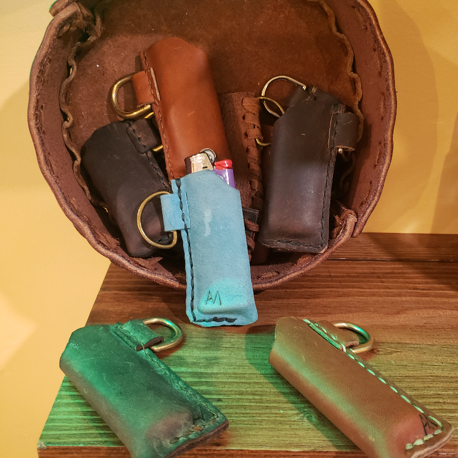 Photograph of product: Arnie Leather Lighter Cases $25