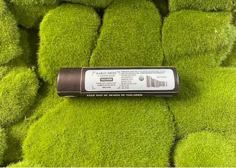 Photograph of product: .9g Rosin Infused Pre Roll Single | Garlic Oreos | Family Tree Oui'd Co.